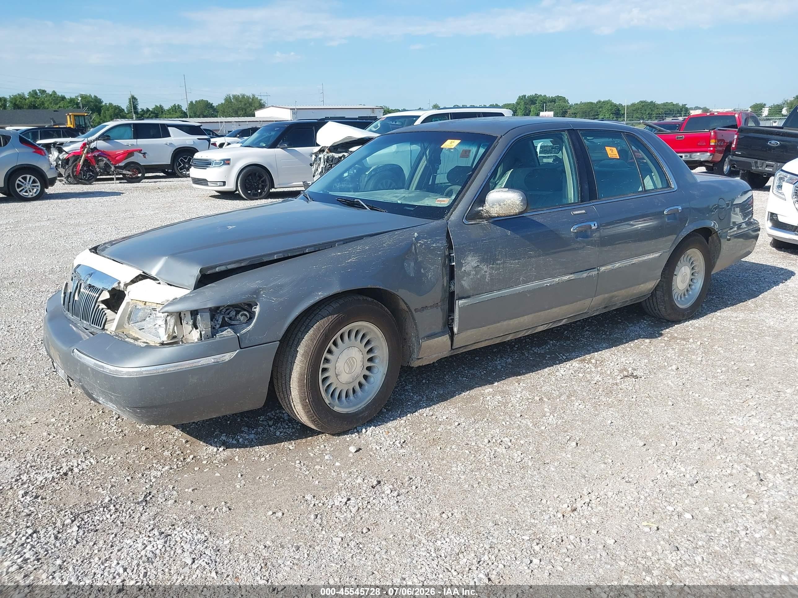 1998 Mercury Grand Marquis   Silver vin: 2MEFM75W4WX659874