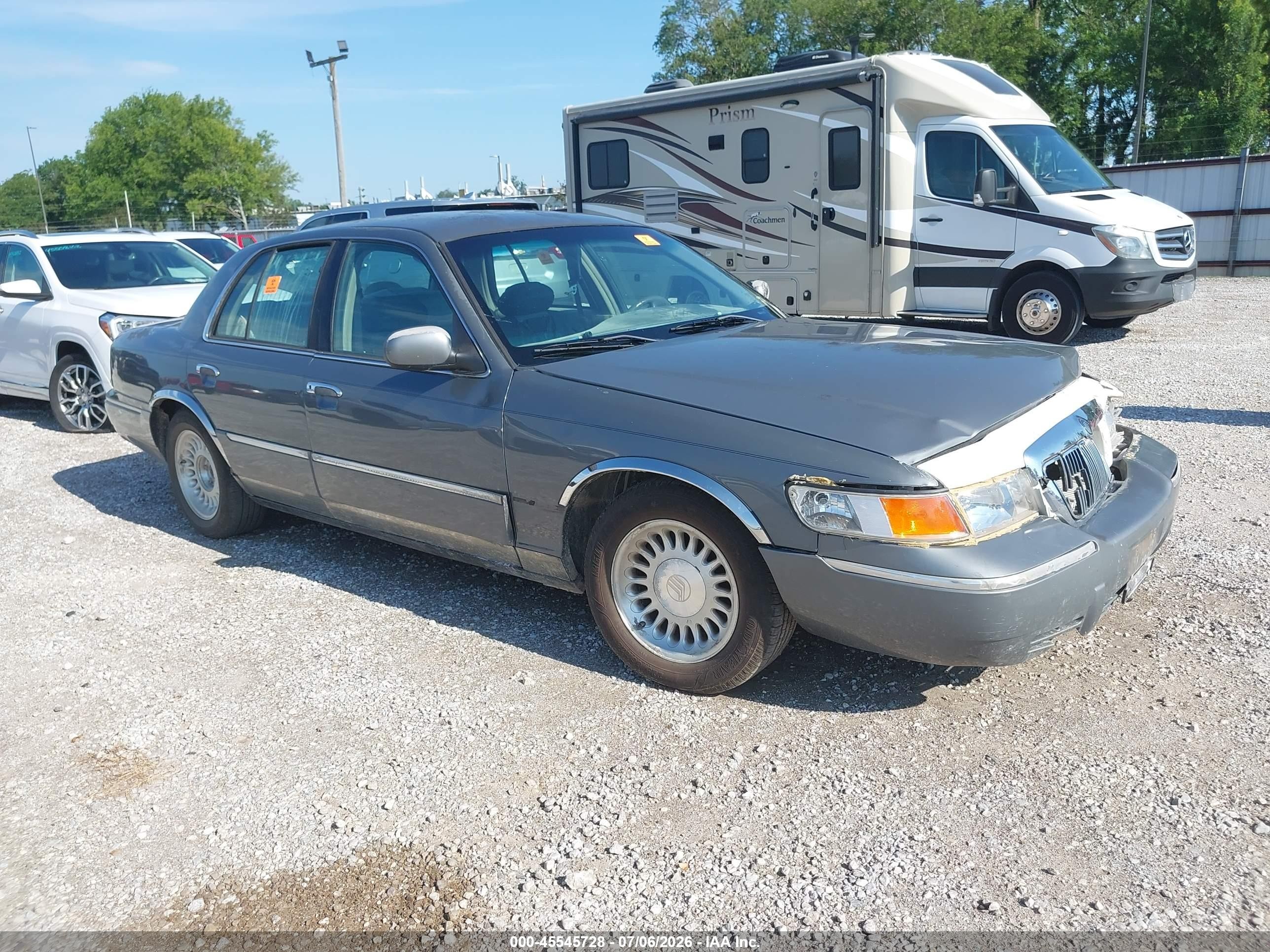1998 Mercury Grand Marquis   Silver vin: 2MEFM75W4WX659874