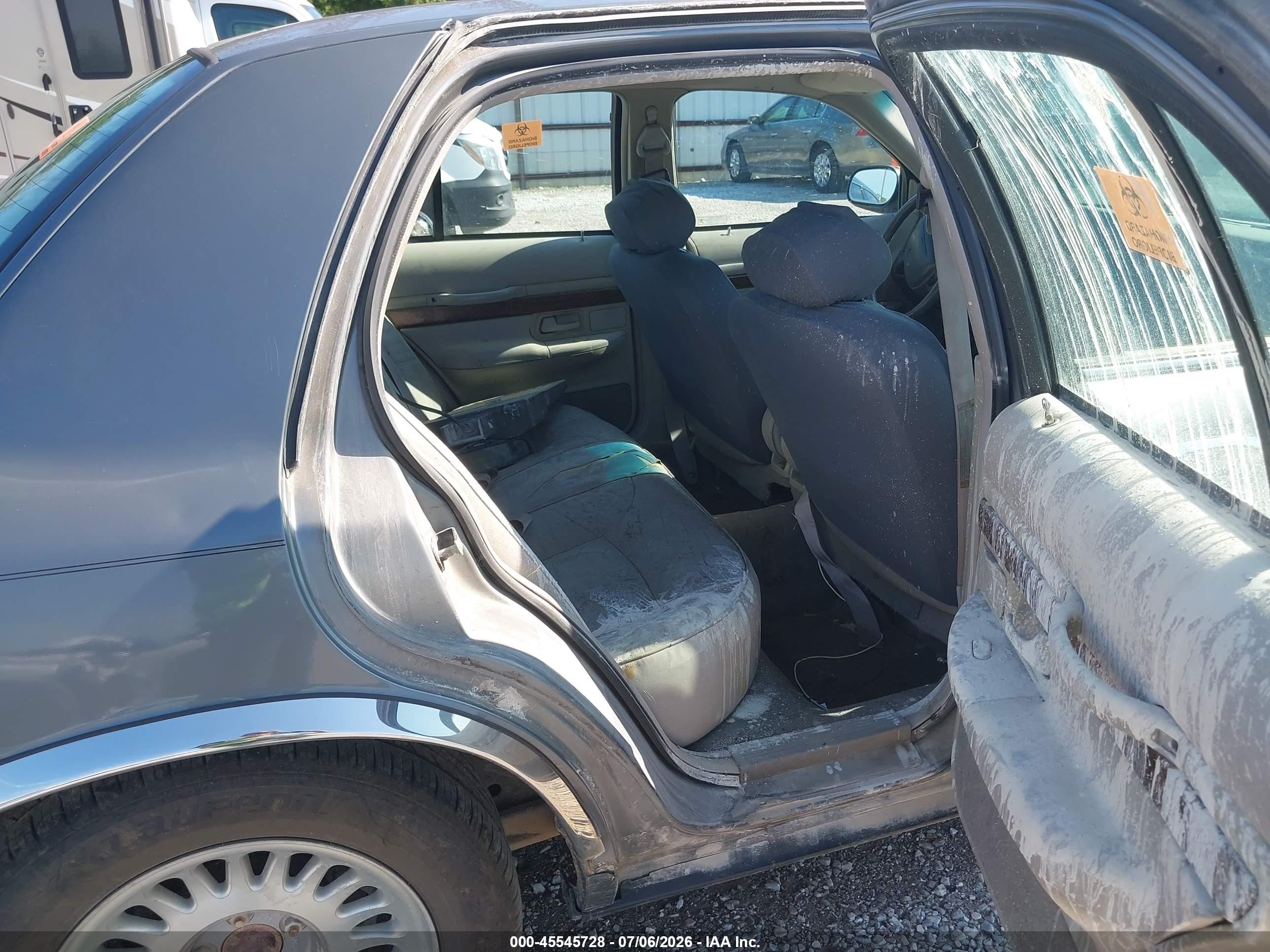 1998 Mercury Grand Marquis   Silver vin: 2MEFM75W4WX659874