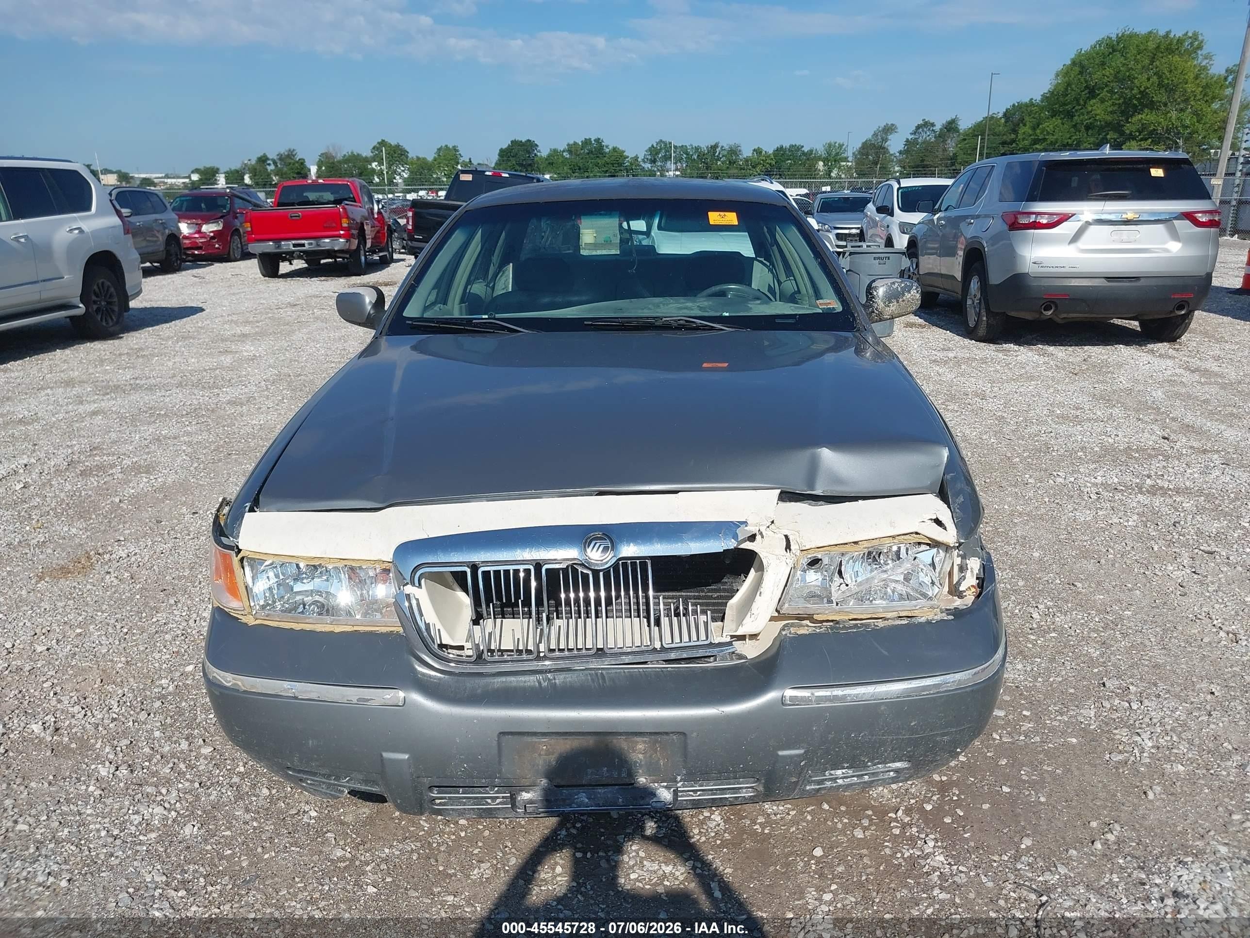 1998 Mercury Grand Marquis   Silver vin: 2MEFM75W4WX659874
