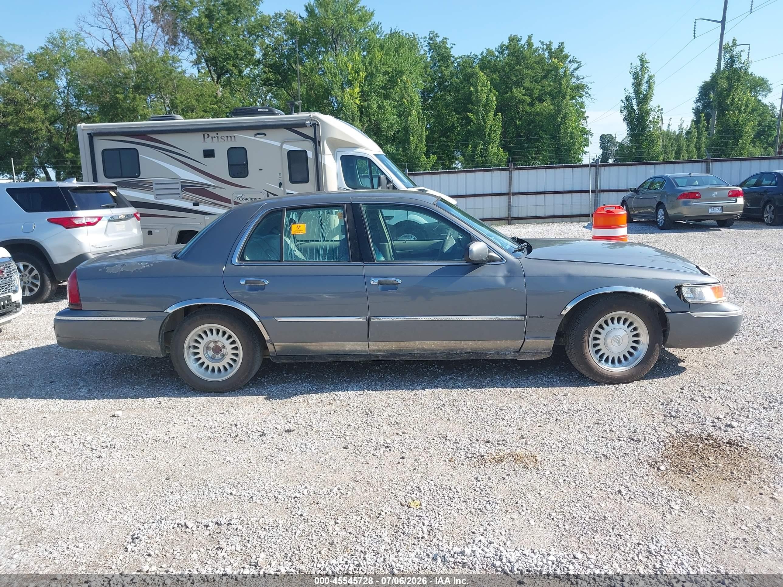 1998 Mercury Grand Marquis   Silver vin: 2MEFM75W4WX659874