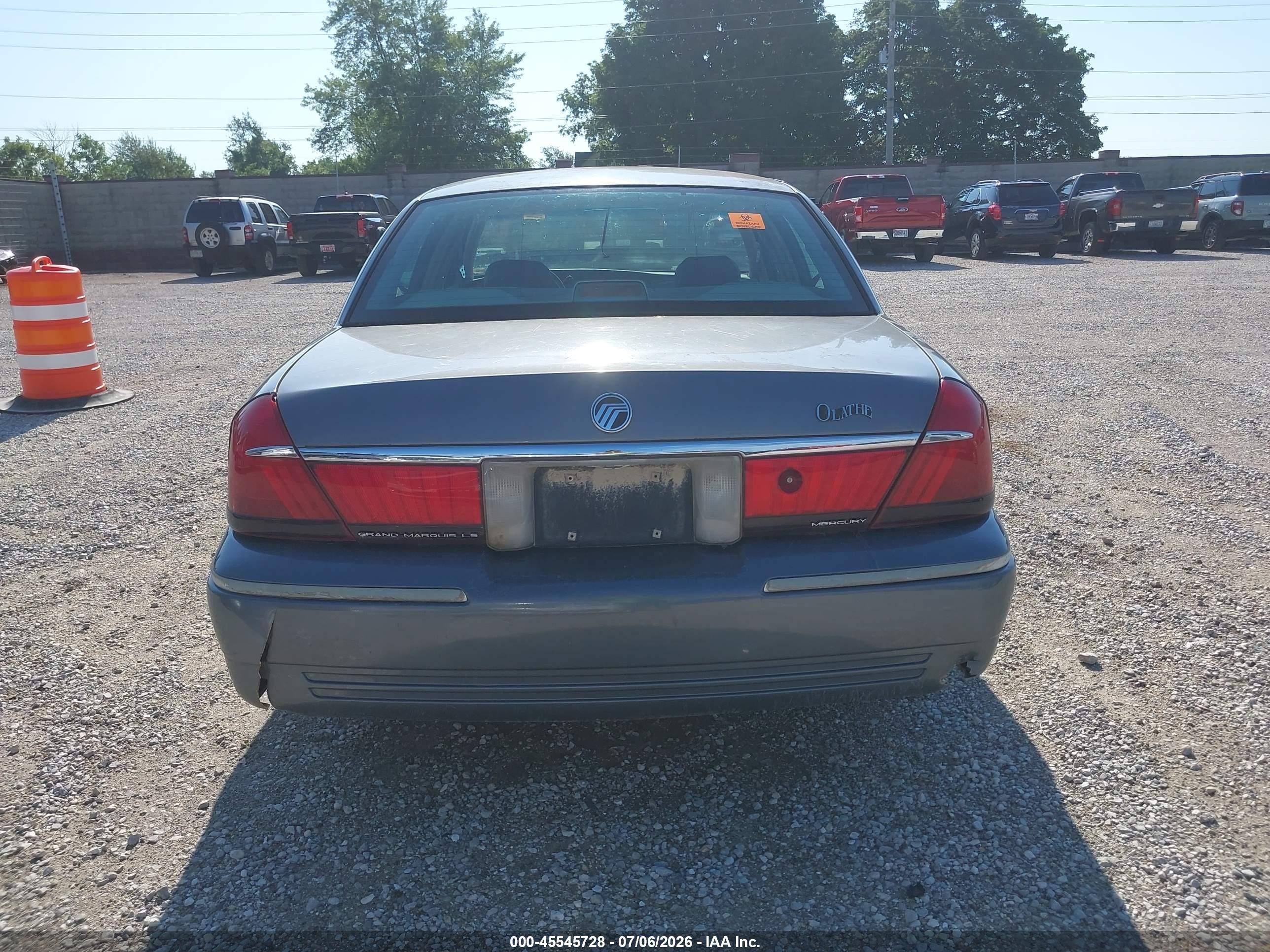 1998 Mercury Grand Marquis   Silver vin: 2MEFM75W4WX659874