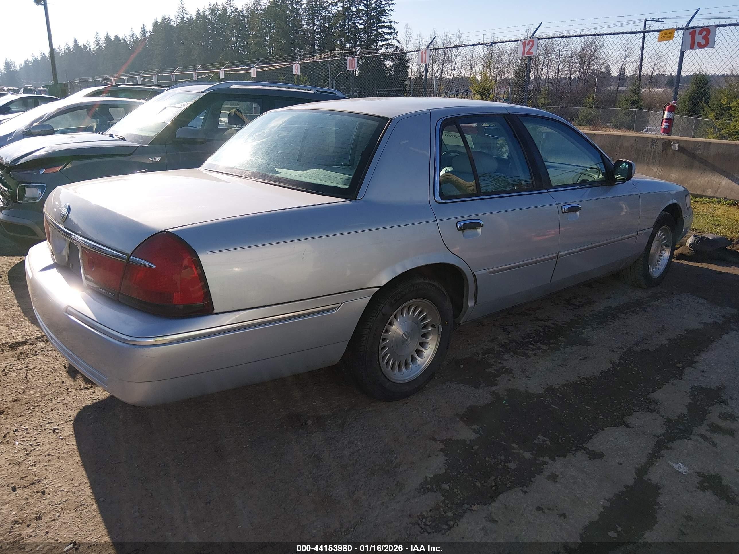 1998 Mercury Grand Marquis   Silver vin: 2MEFM75W5WX648883