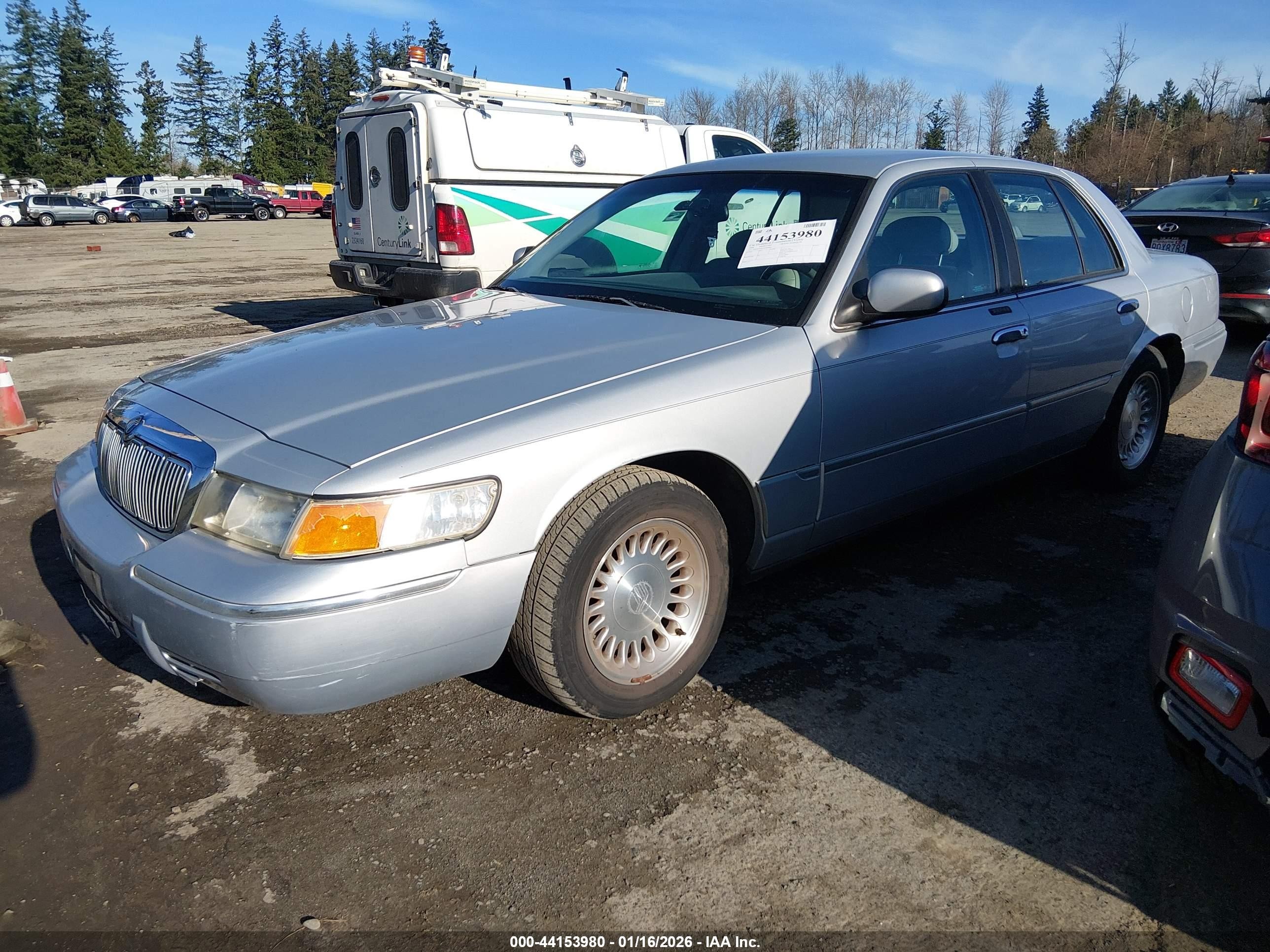 1998 Mercury Grand Marquis   Silver vin: 2MEFM75W5WX648883