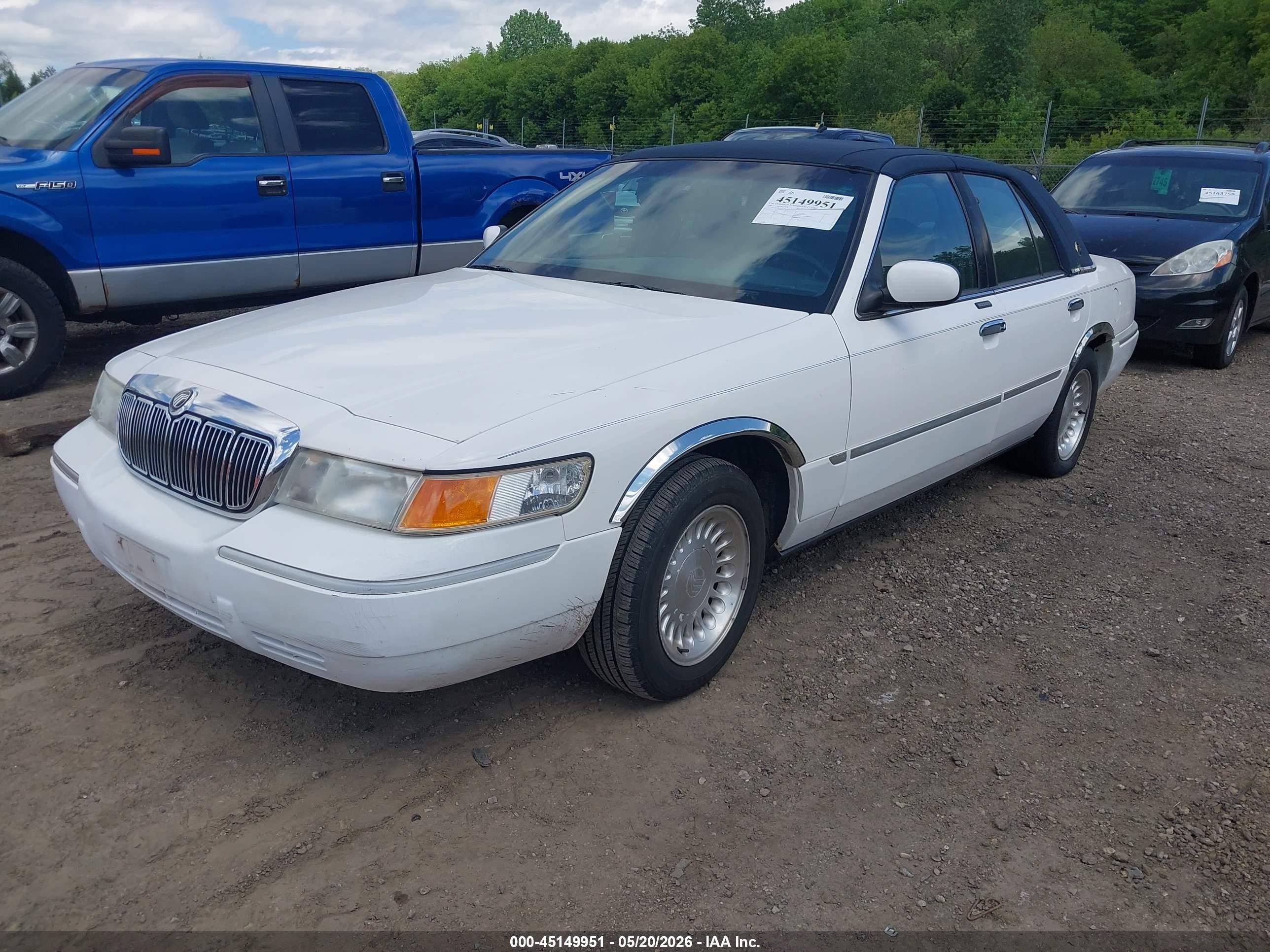 1998 Mercury Grand Marquis   White vin: 2MEFM75W6WX679978