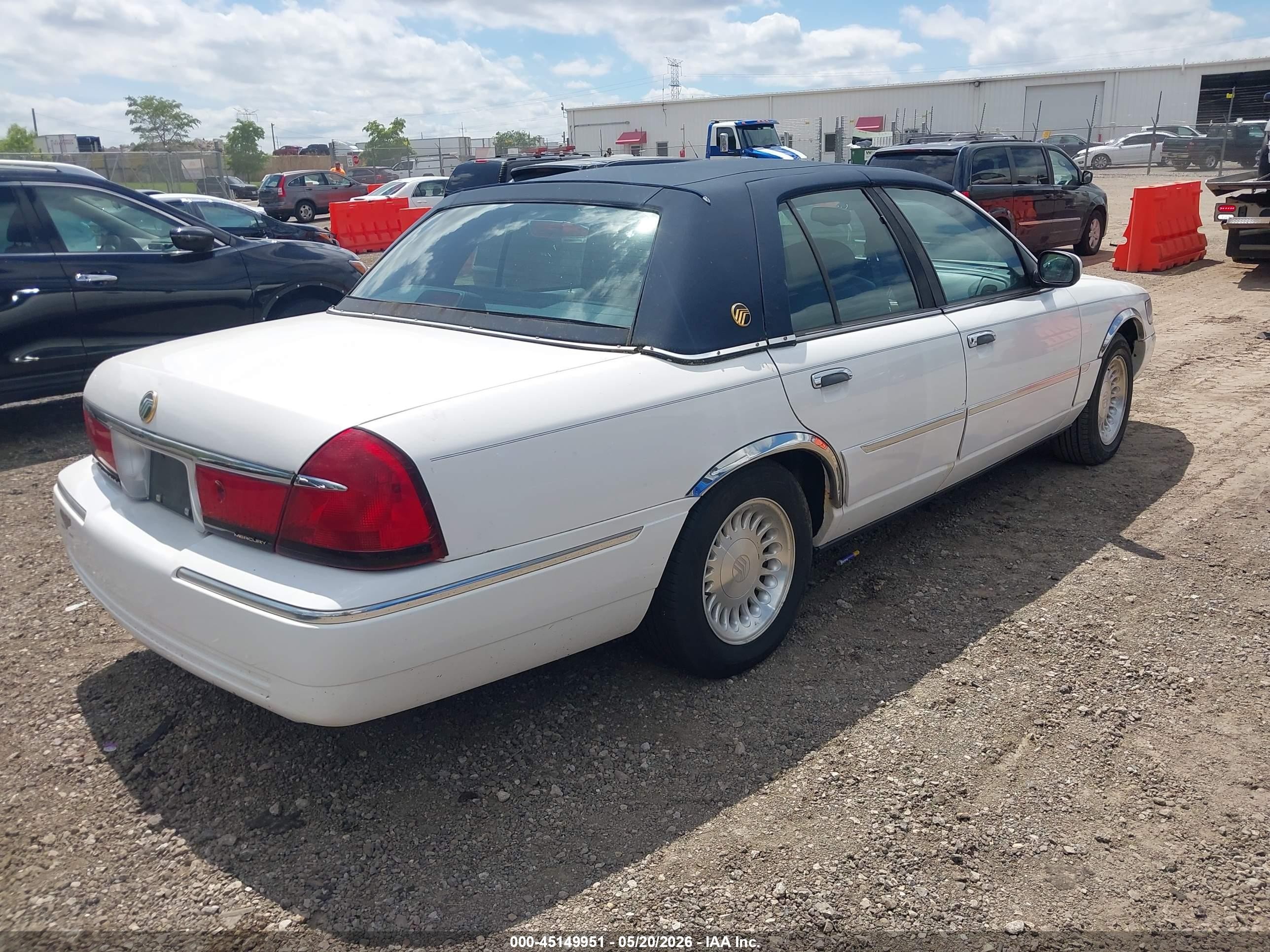 1998 Mercury Grand Marquis   White vin: 2MEFM75W6WX679978