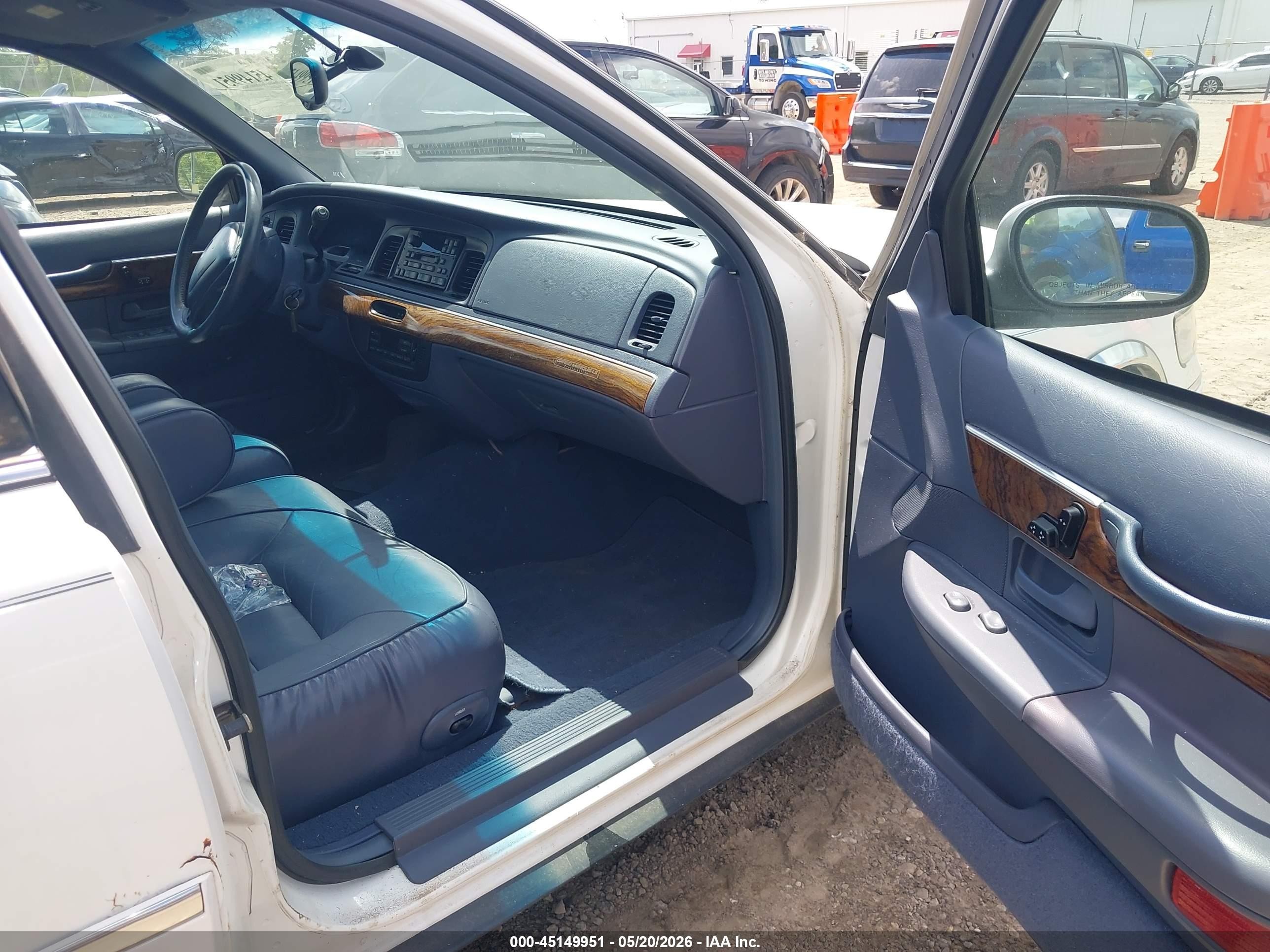1998 Mercury Grand Marquis   White vin: 2MEFM75W6WX679978