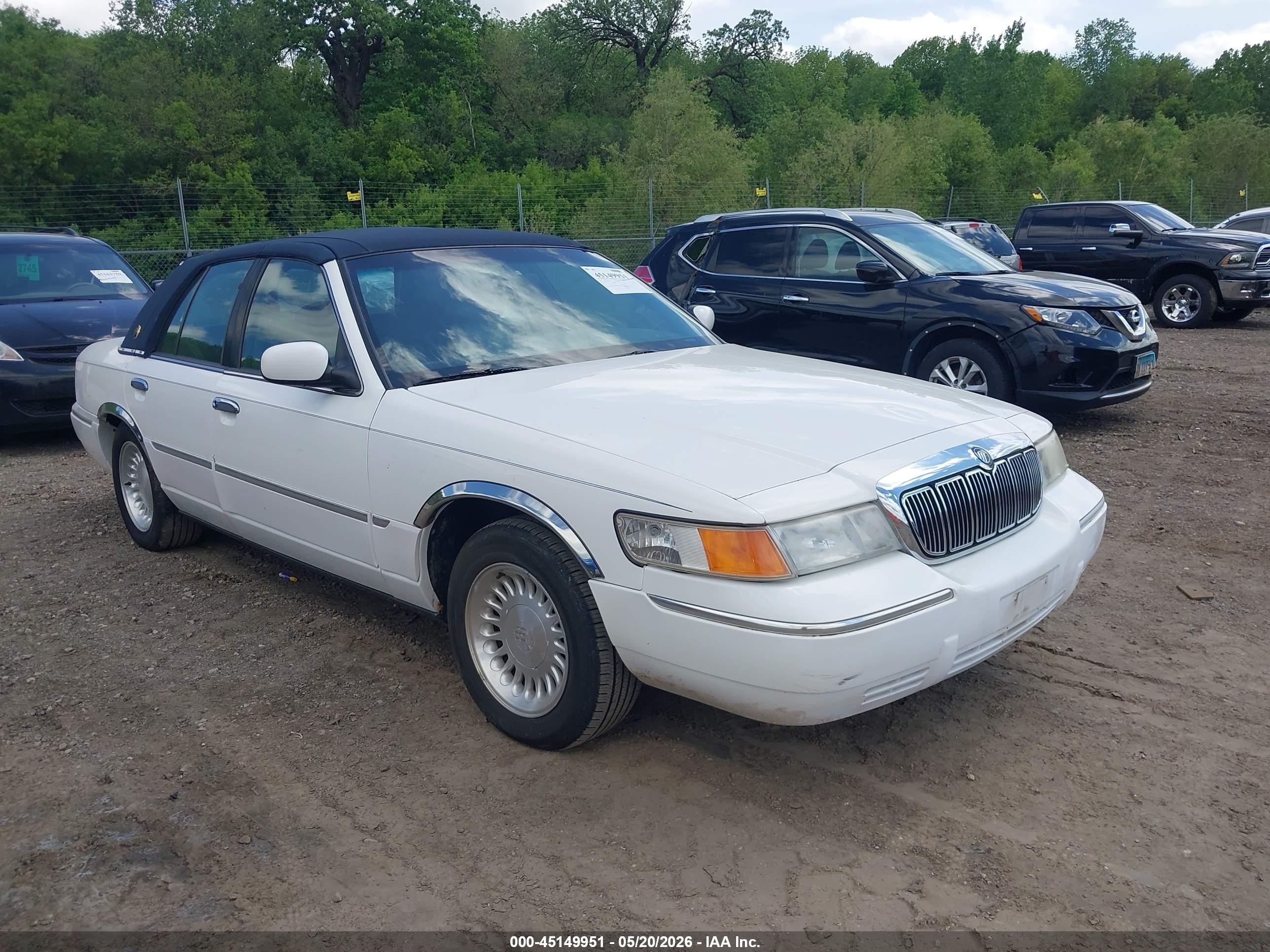 1998 Mercury Grand Marquis   White vin: 2MEFM75W6WX679978