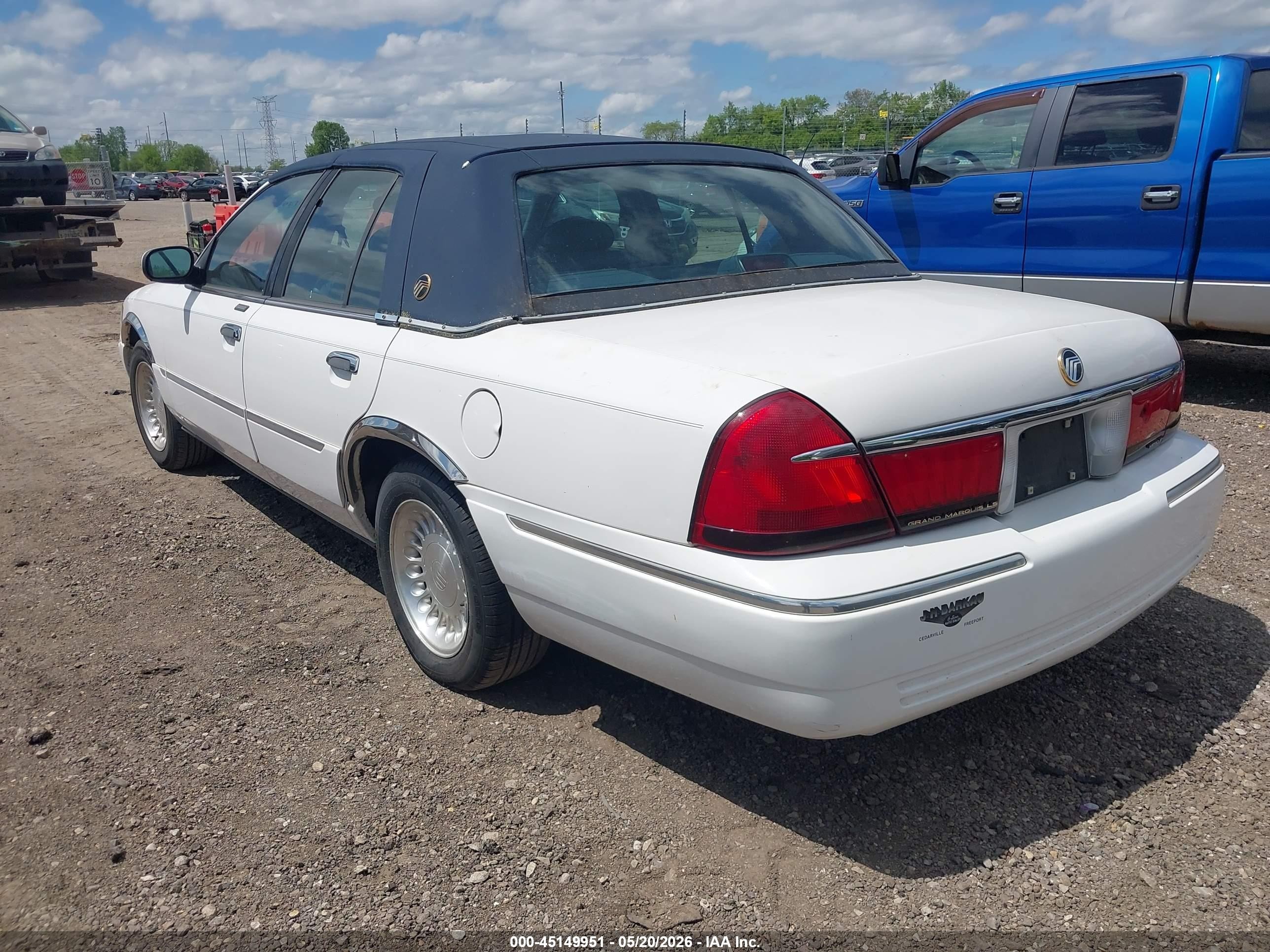 1998 Mercury Grand Marquis   White vin: 2MEFM75W6WX679978