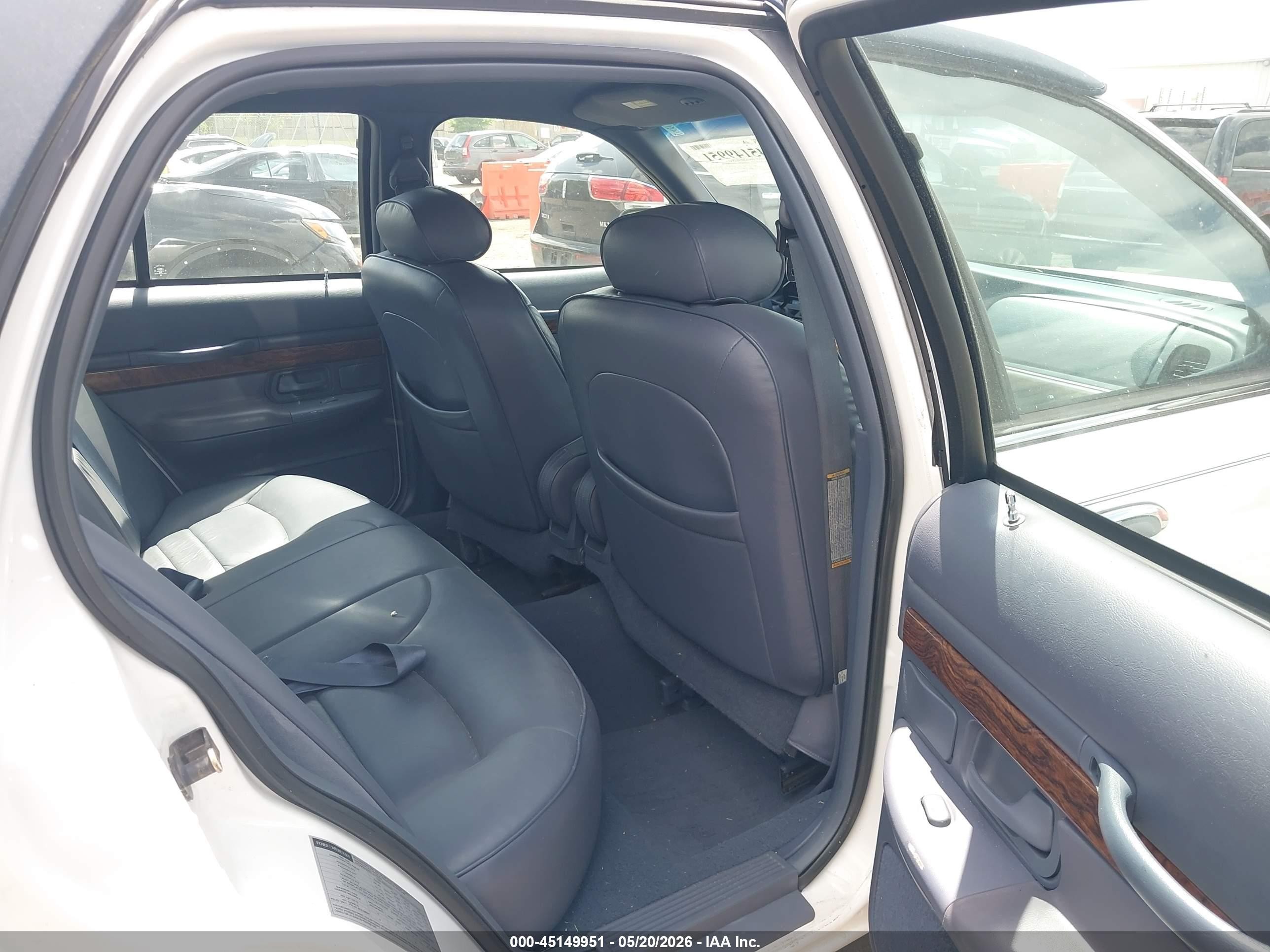 1998 Mercury Grand Marquis   White vin: 2MEFM75W6WX679978
