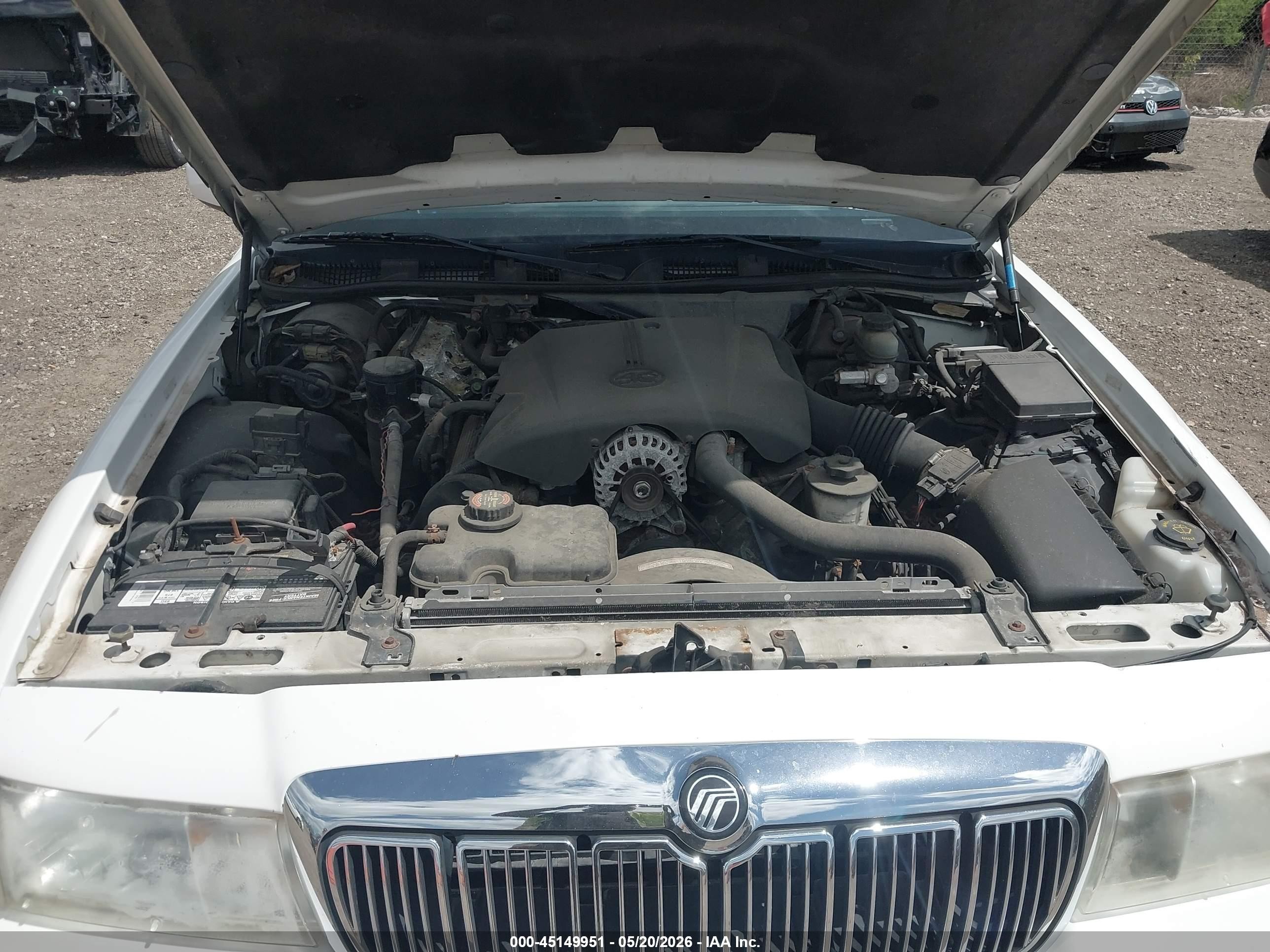 1998 Mercury Grand Marquis   White vin: 2MEFM75W6WX679978