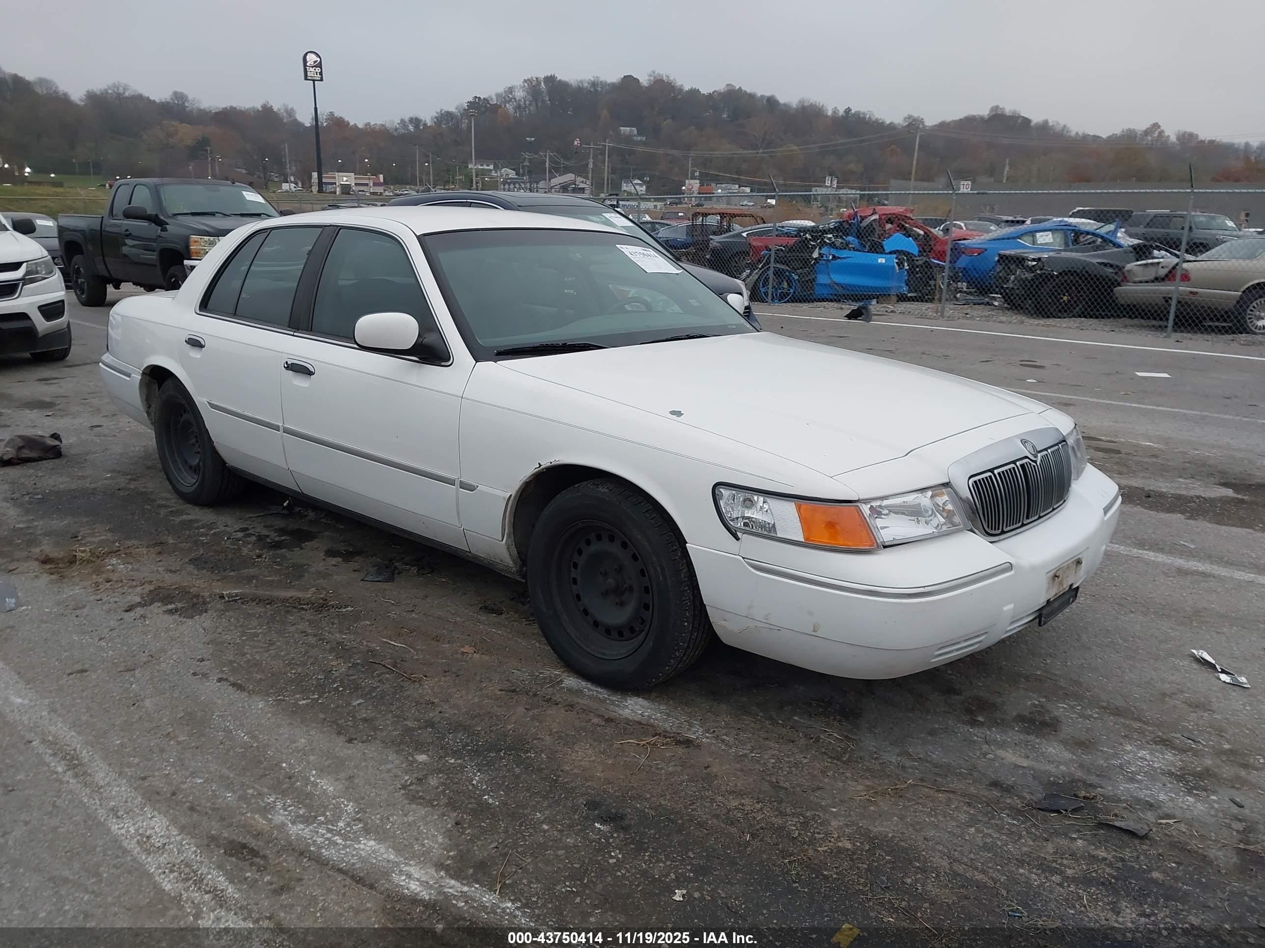 1998 Mercury Grand Marquis   White vin: 2MEFM75W7WX684266