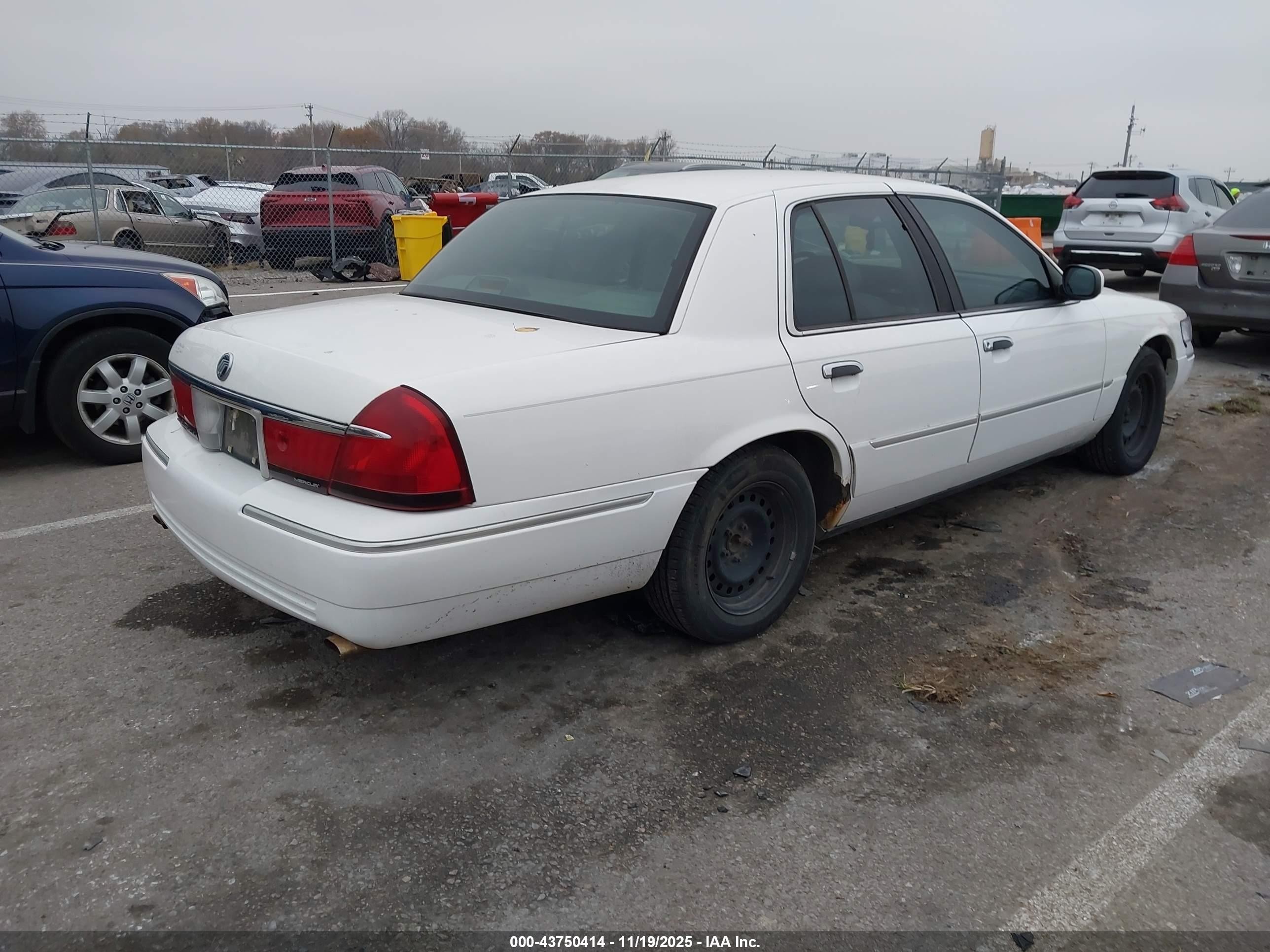 1998 Mercury Grand Marquis   White vin: 2MEFM75W7WX684266