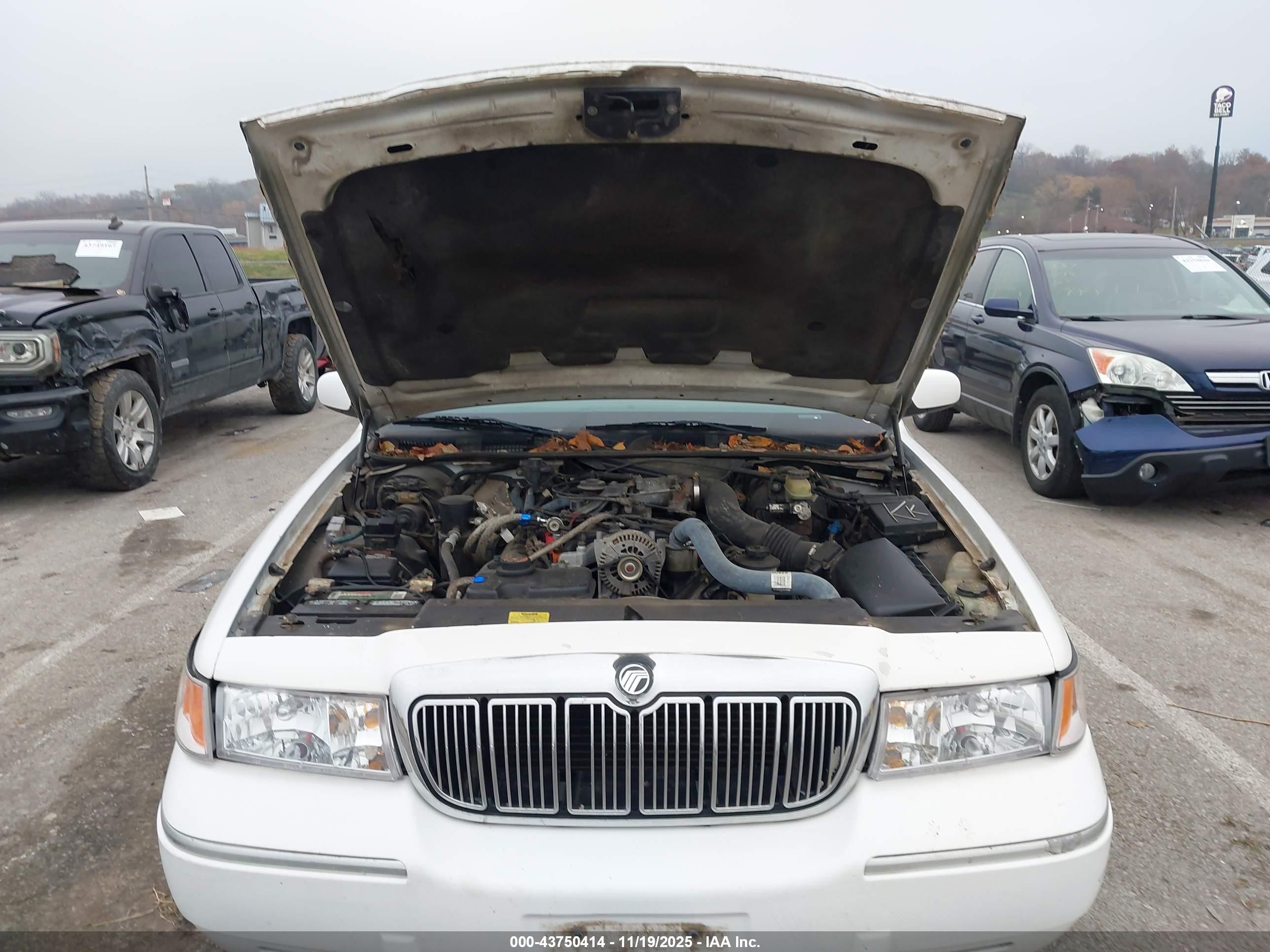 1998 Mercury Grand Marquis   White vin: 2MEFM75W7WX684266