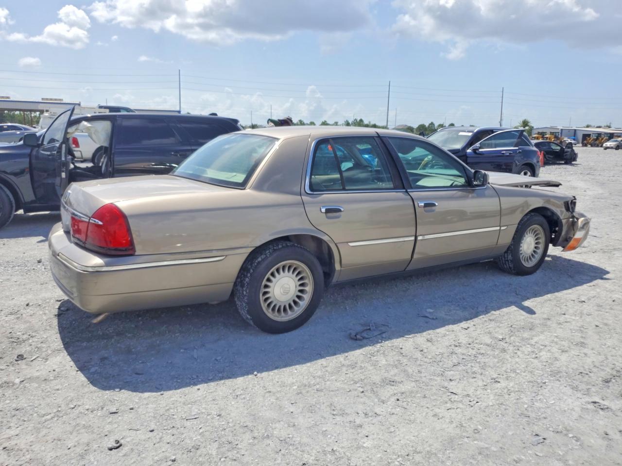 2001 Mercury Grand Marquis Ls Gold vin: 2MEFM75W81X665881