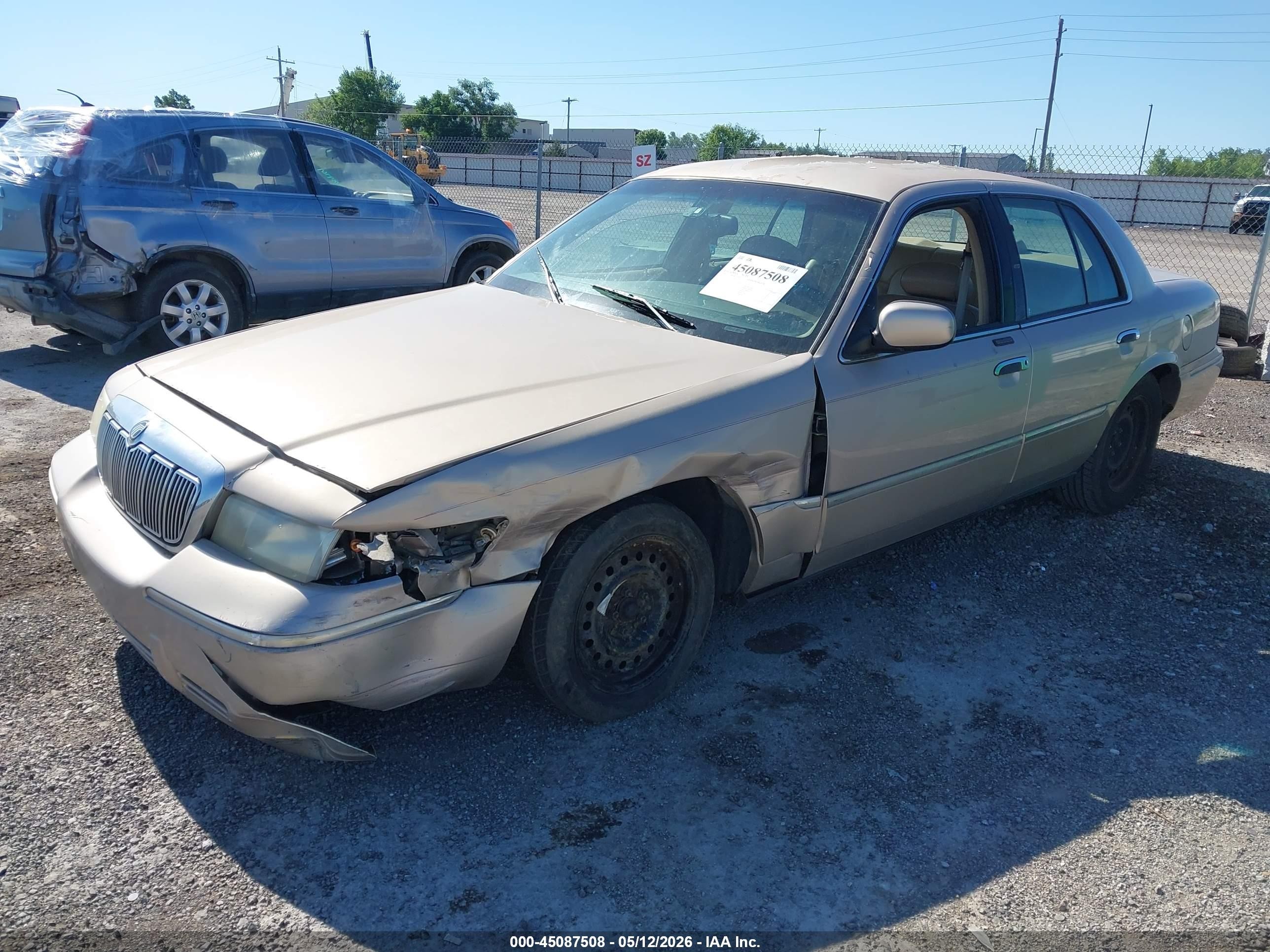 1998 Mercury Grand Marquis   Gold vin: 2MEFM75W8WX621709