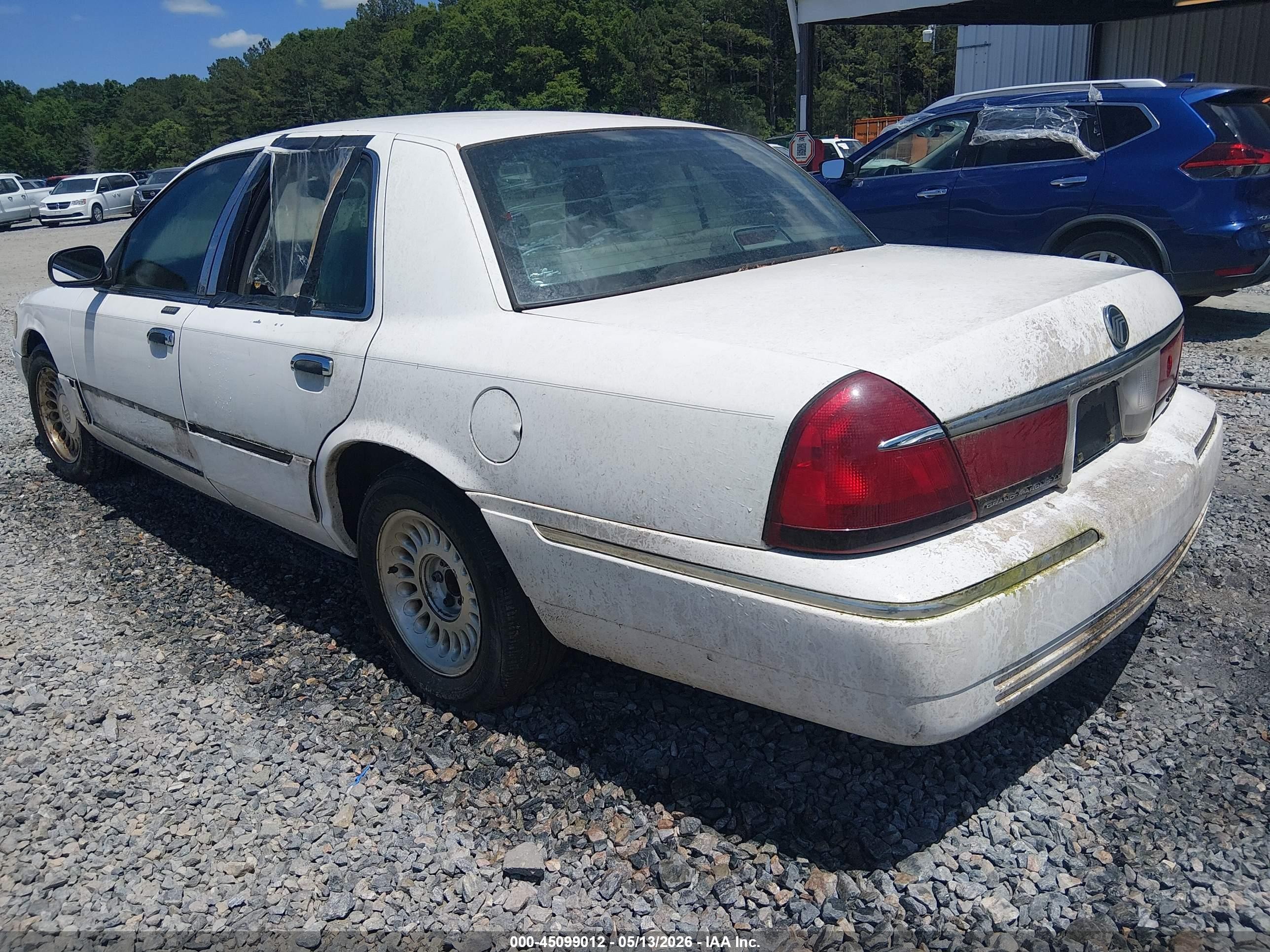 1998 Mercury Grand Marquis   White vin: 2MEFM75W8WX625467