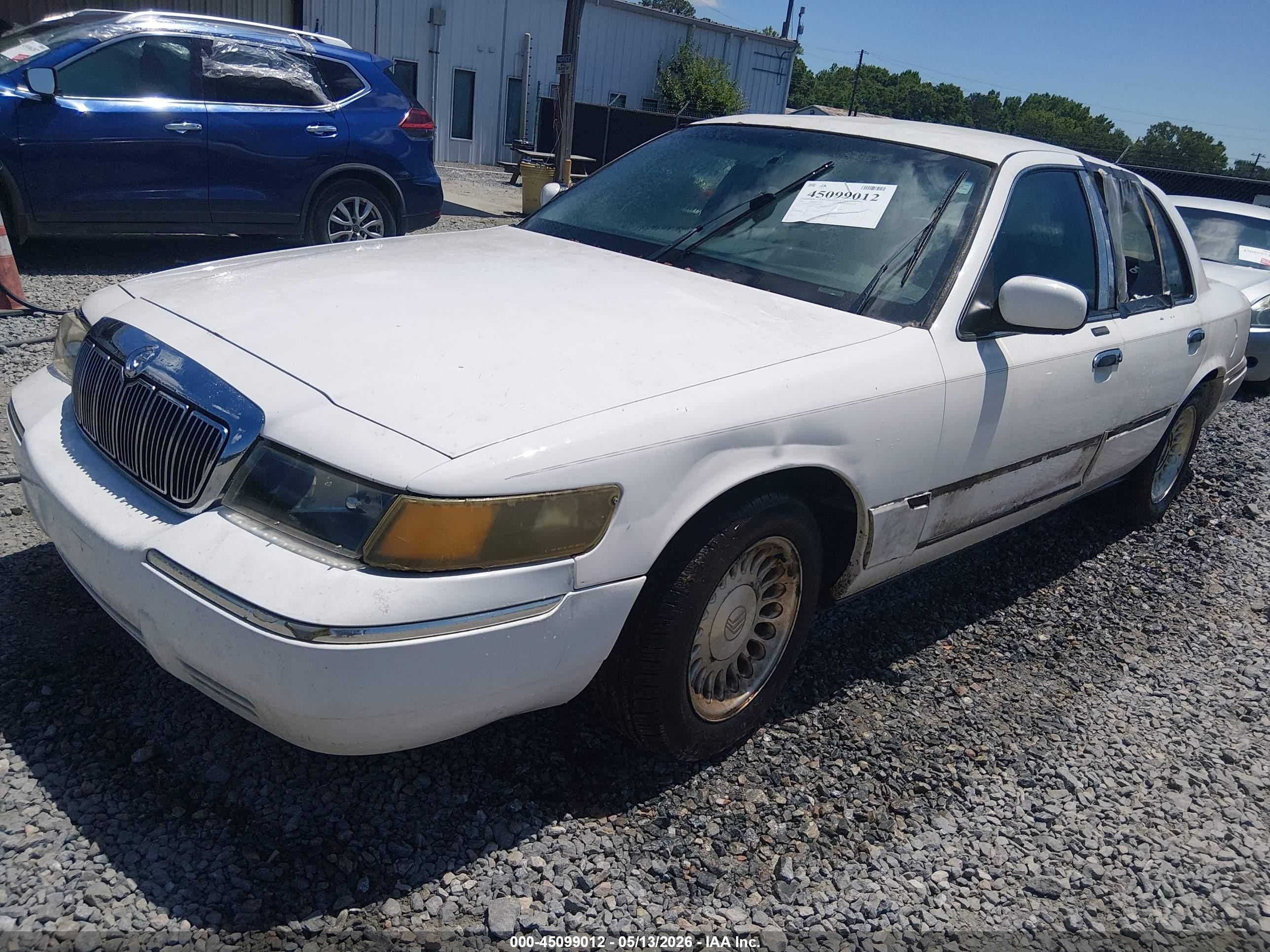 1998 Mercury Grand Marquis   White vin: 2MEFM75W8WX625467