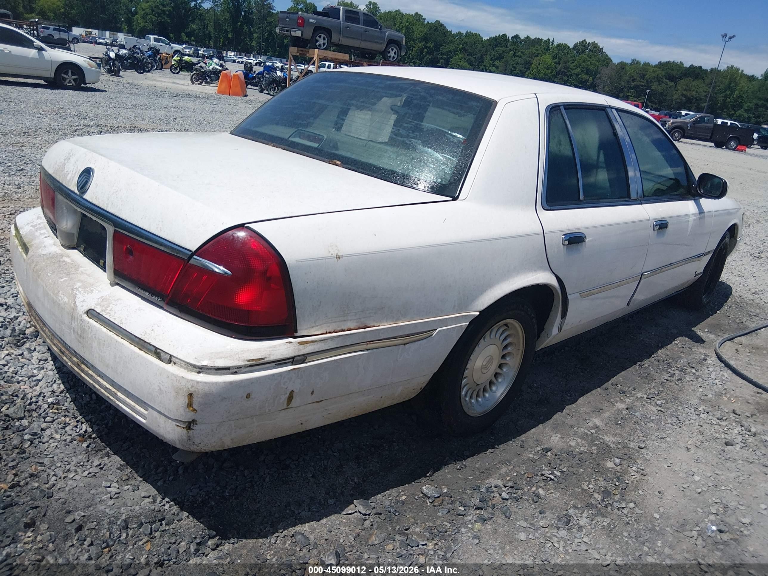 1998 Mercury Grand Marquis   White vin: 2MEFM75W8WX625467