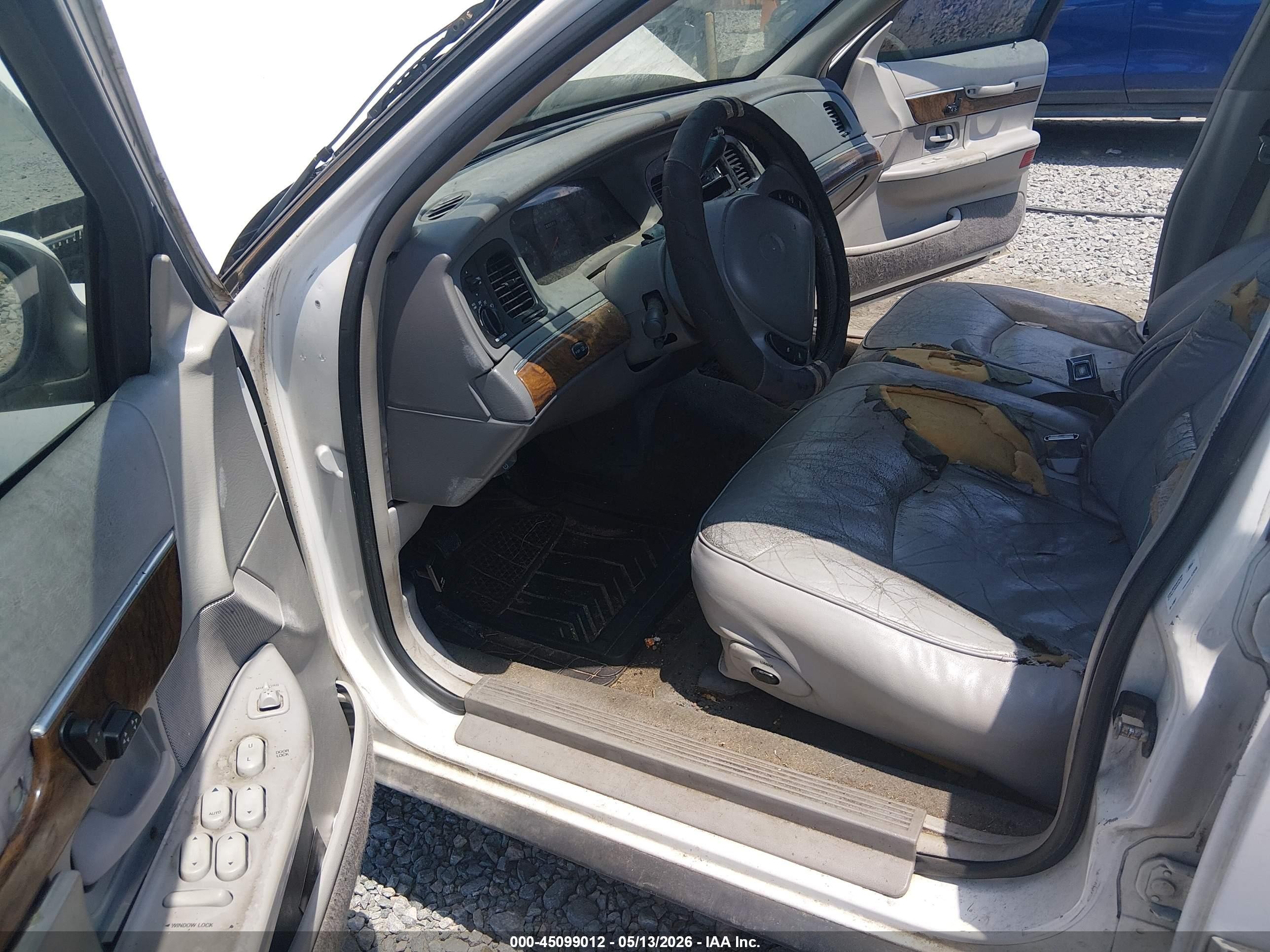 1998 Mercury Grand Marquis   White vin: 2MEFM75W8WX625467