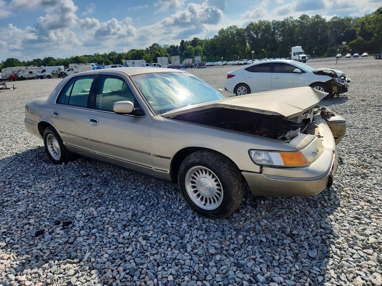 1999 Mercury Grand Marquis Ls Tan vin: 2MEFM75W8XX672208