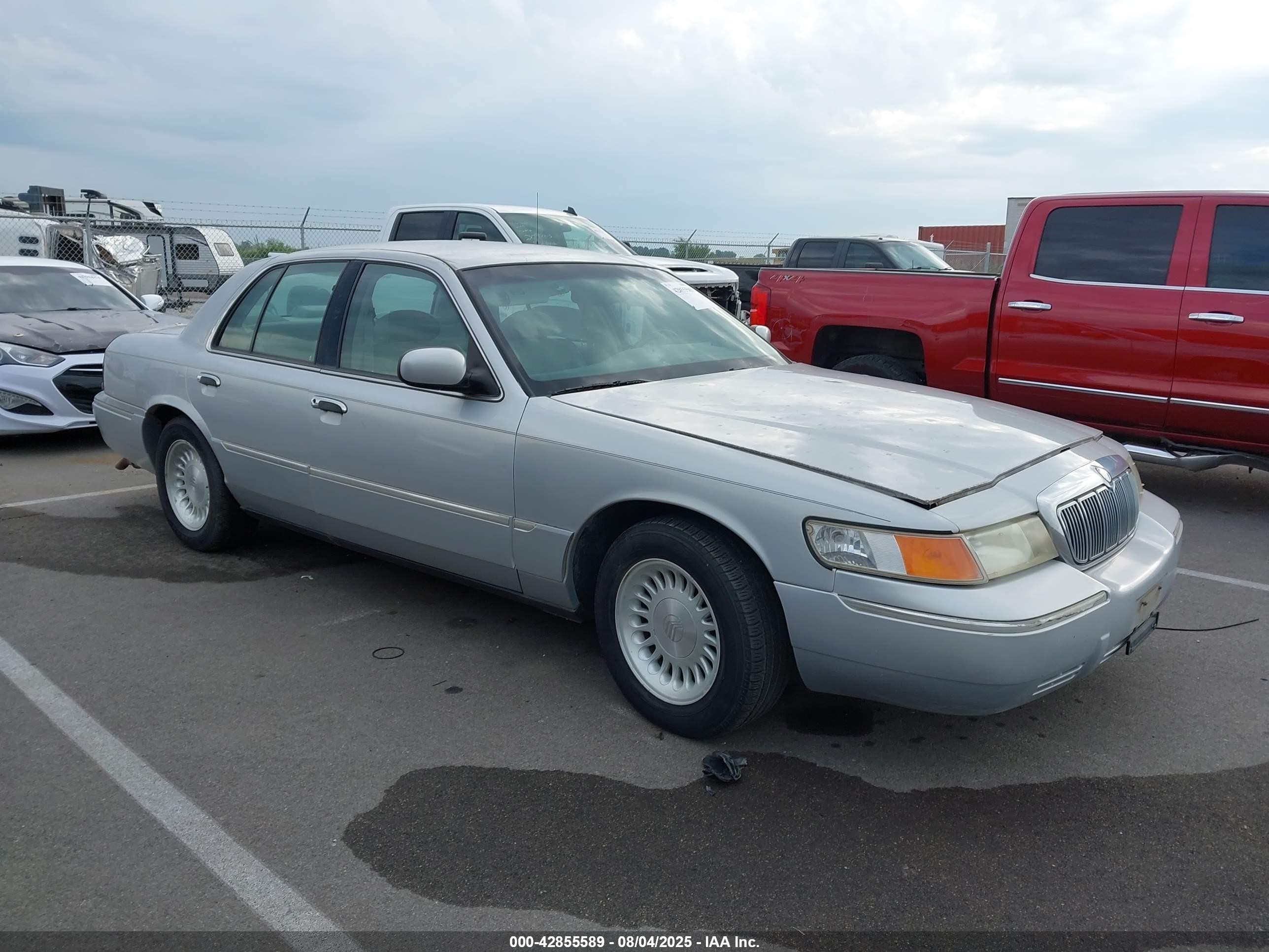 1998 Mercury Grand Marquis   Silver vin: 2MEFM75W9WX643962