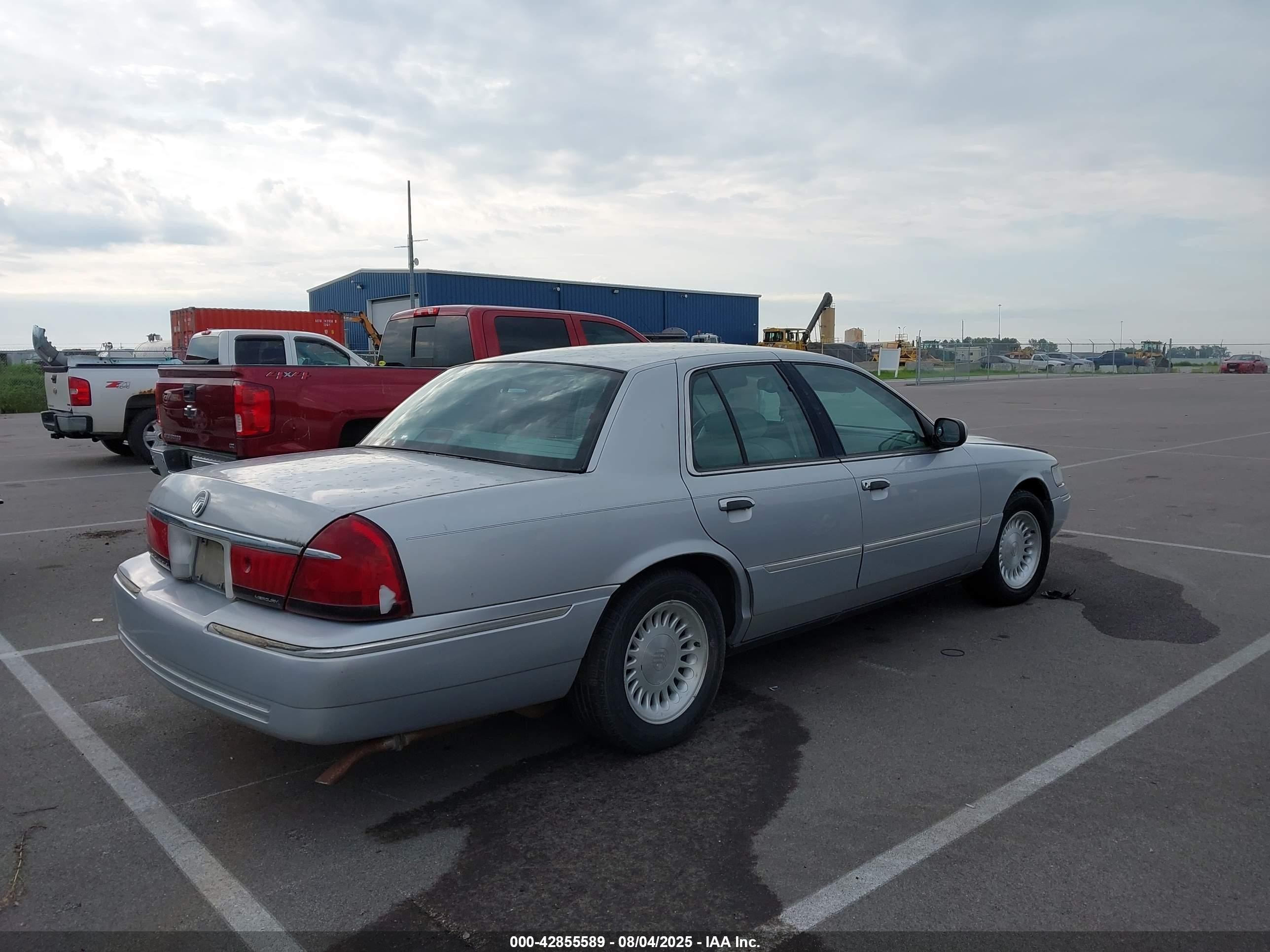 1998 Mercury Grand Marquis   Silver vin: 2MEFM75W9WX643962