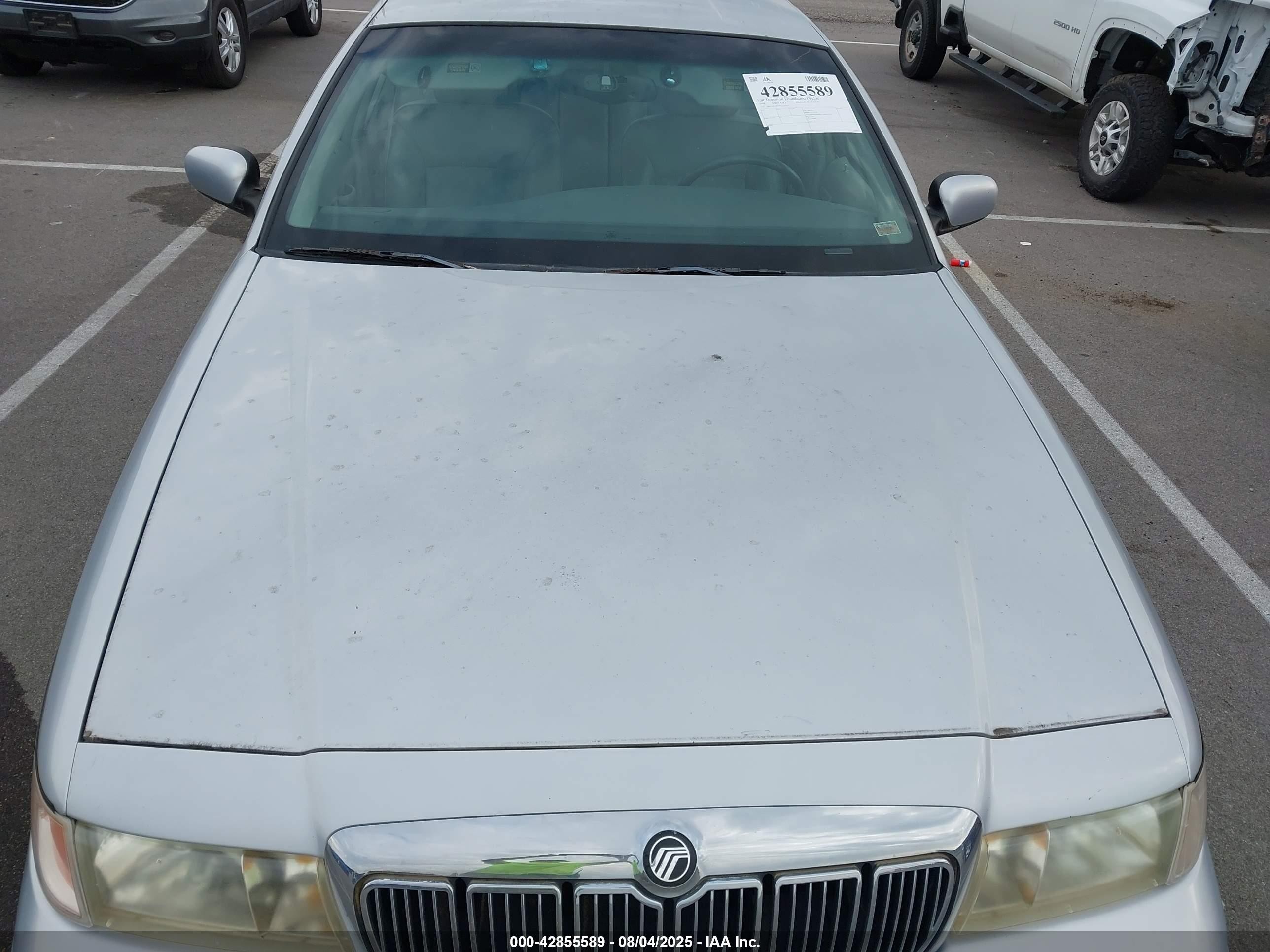 1998 Mercury Grand Marquis   Silver vin: 2MEFM75W9WX643962