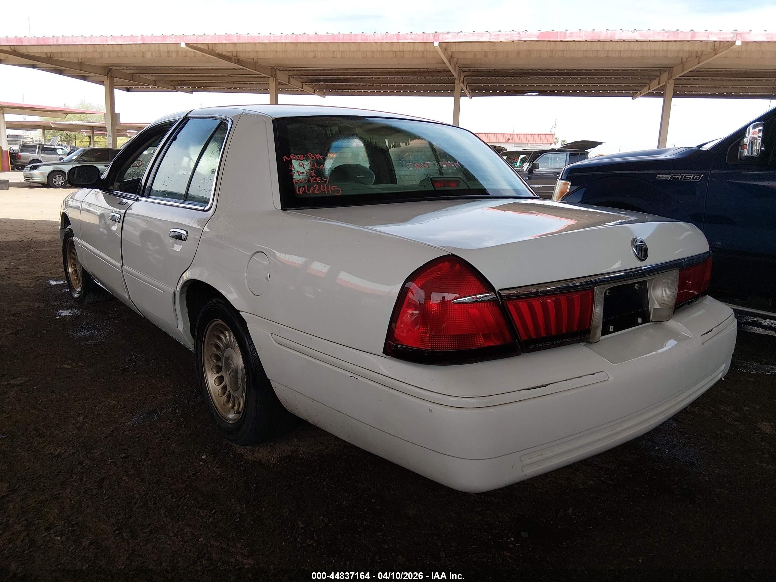 1998 Mercury Grand Marquis   White vin: 2MEFM75W9WX662415