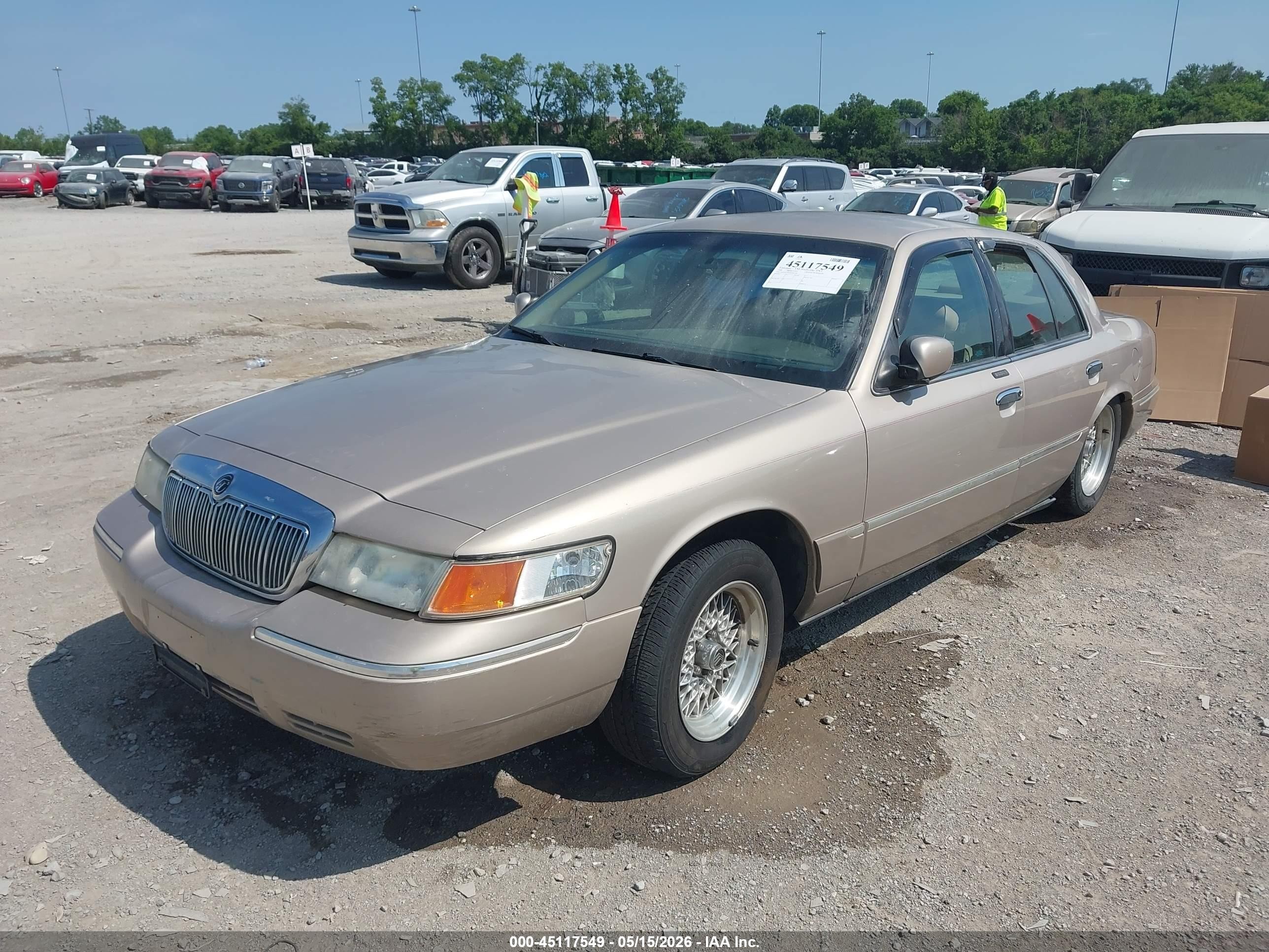 1998 Mercury Grand Marquis   Tan vin: 2MEFM75W9WX681448
