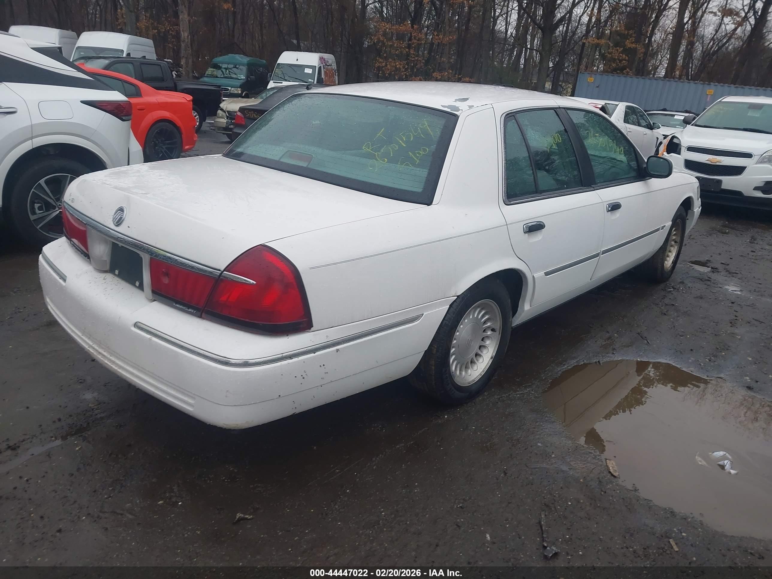 1998 Mercury Grand Marquis   White vin: 2MEFM75W9WX700127