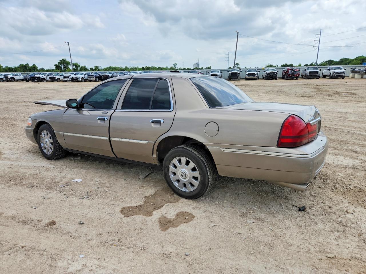 2003 Mercury Grand Marquis Золотой vin: 2MEFM75WX3X704439