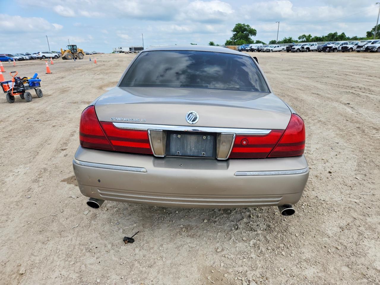 2003 Mercury Grand Marquis Золотой vin: 2MEFM75WX3X704439