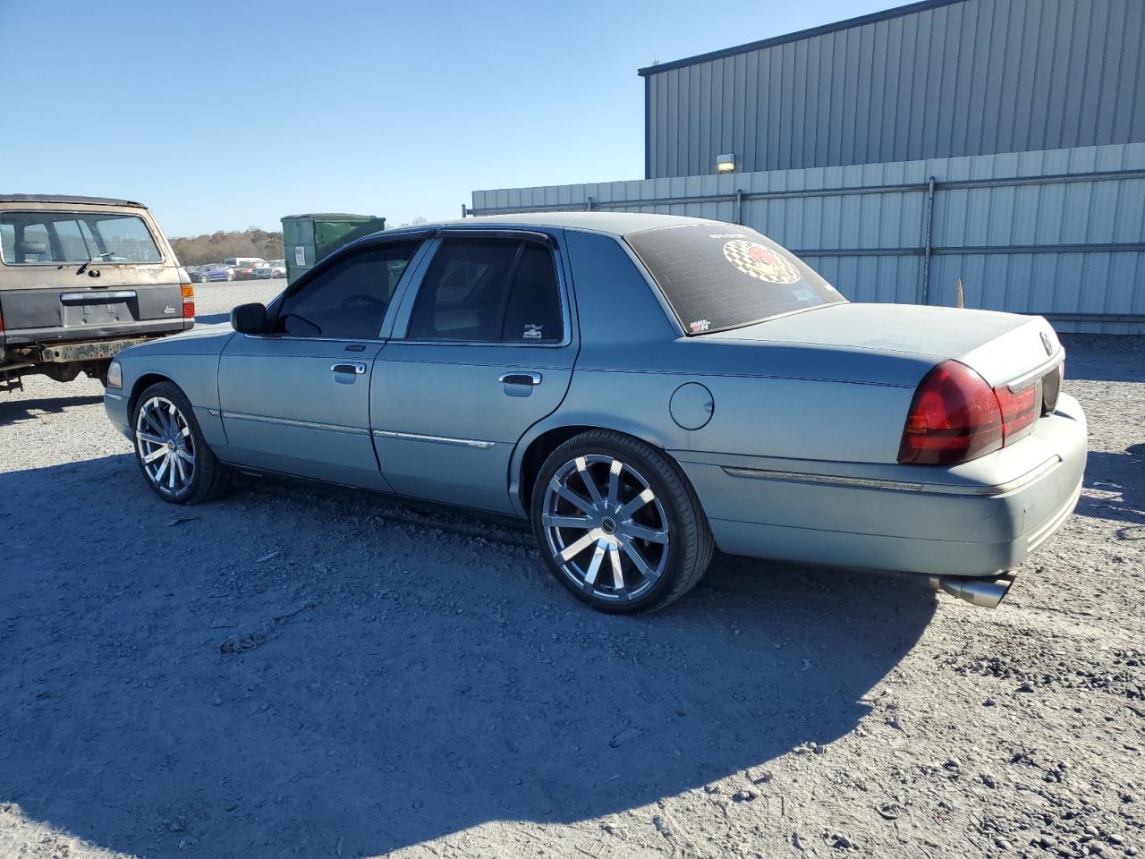 2005 Mercury Marquis Silver vin: 2MEFM75WX5X630328