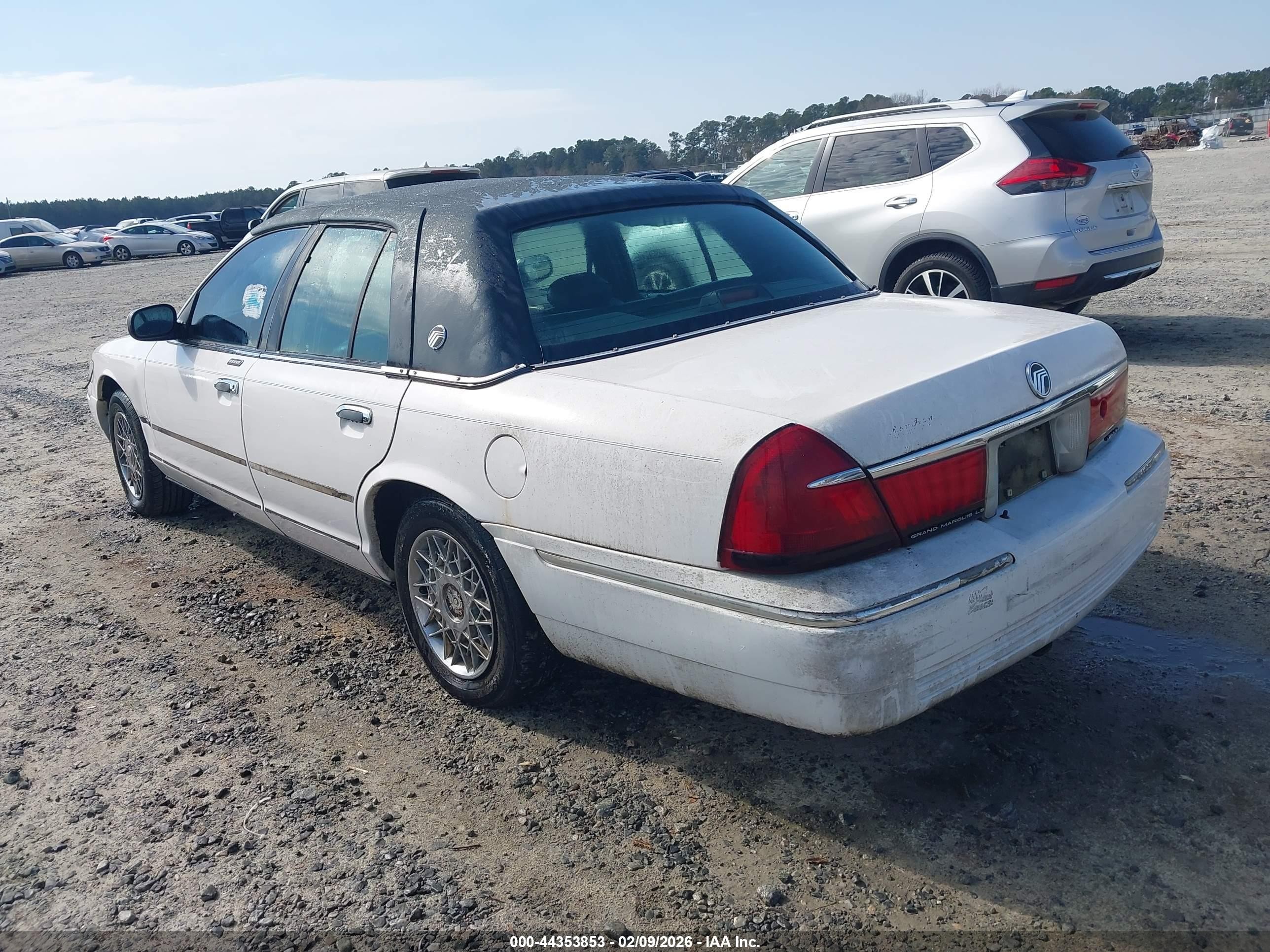 1998 Mercury Grand Marquis   White vin: 2MEFM75WXWX621436
