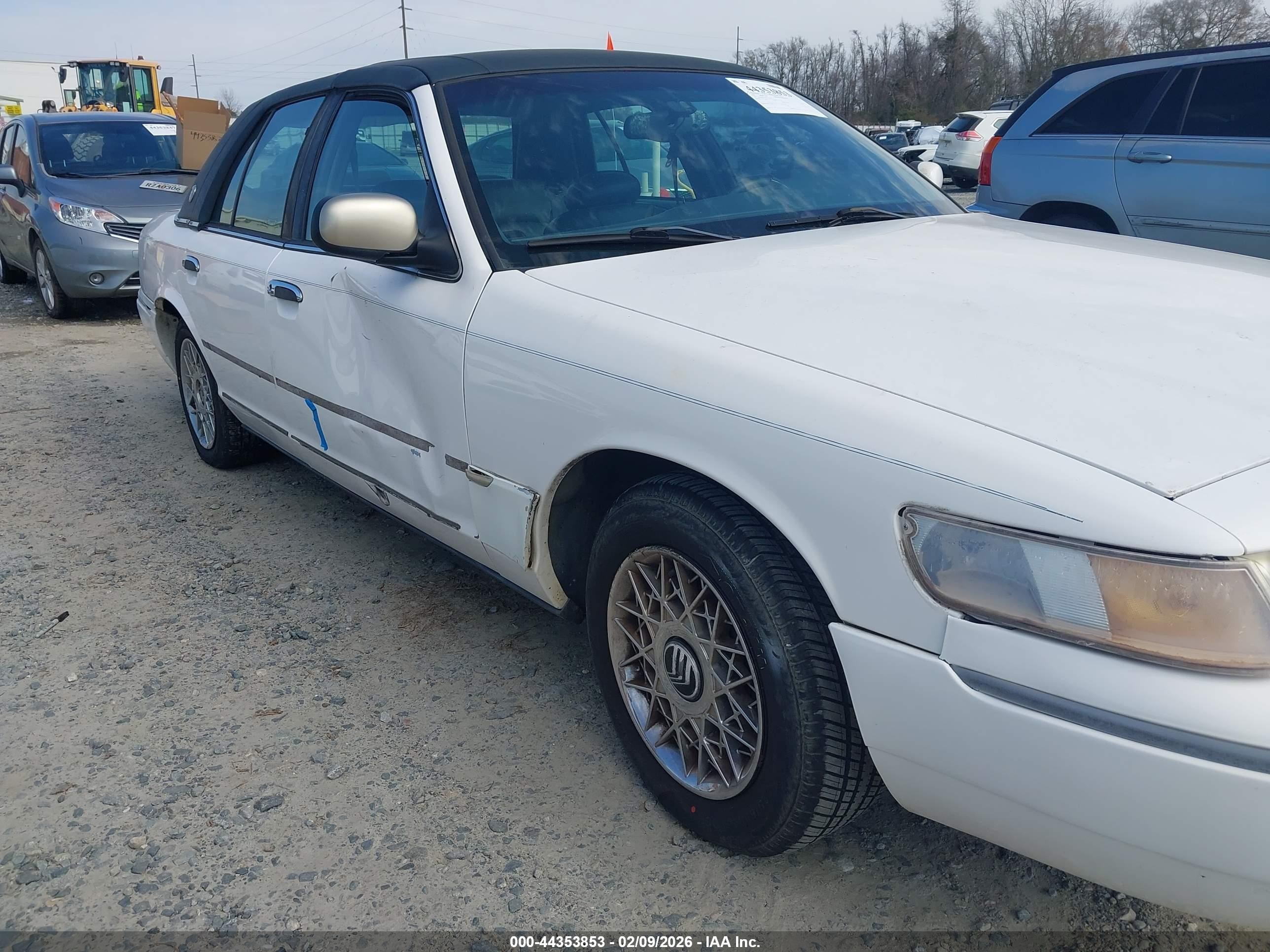 1998 Mercury Grand Marquis   White vin: 2MEFM75WXWX621436