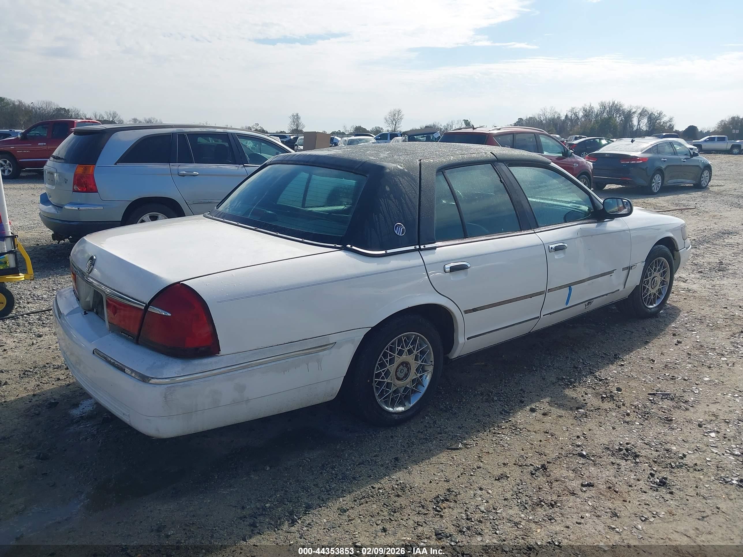 1998 Mercury Grand Marquis   White vin: 2MEFM75WXWX621436