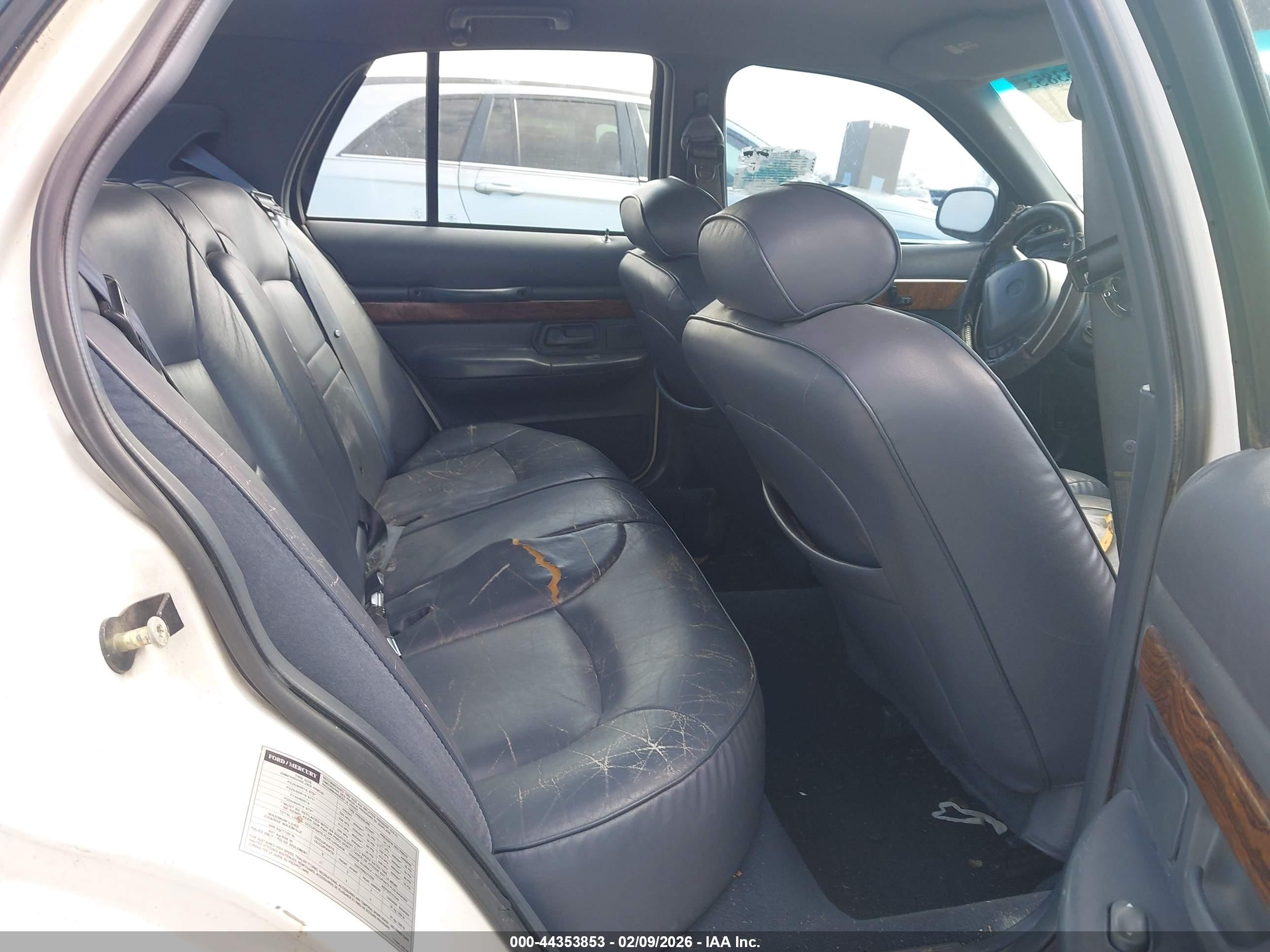 1998 Mercury Grand Marquis   White vin: 2MEFM75WXWX621436