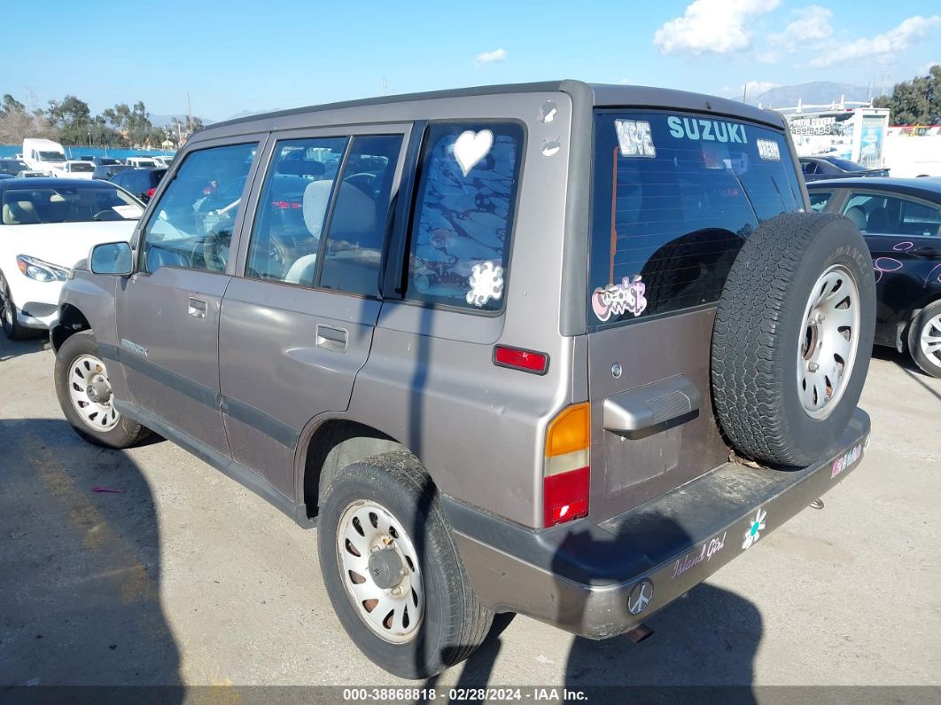 Price & History 1997 Suzuki Sidekick Jx 1.6l I-4 95hp vin