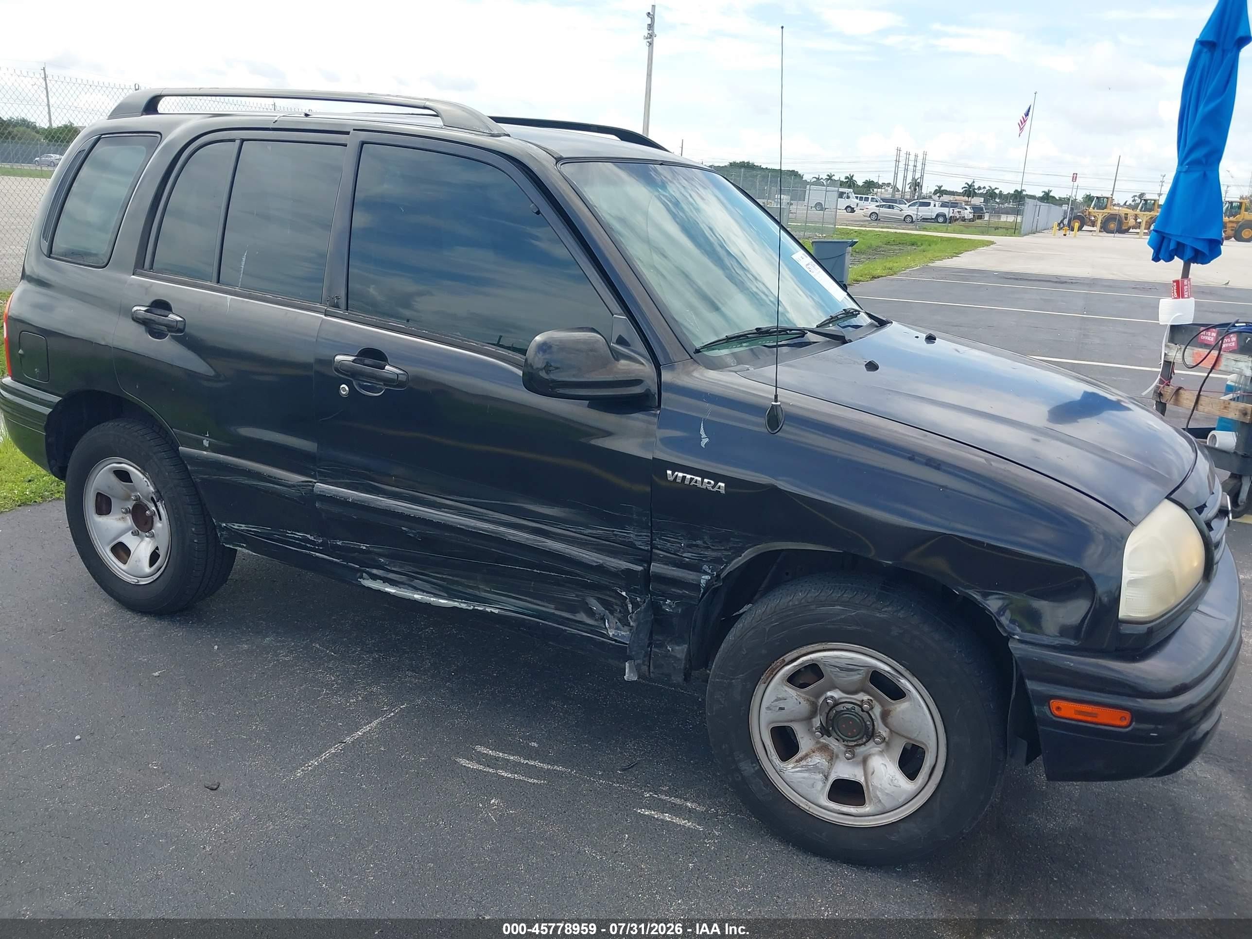 2002 Suzuki Vitara Jls Black vin: 2S3TE52VX26102597