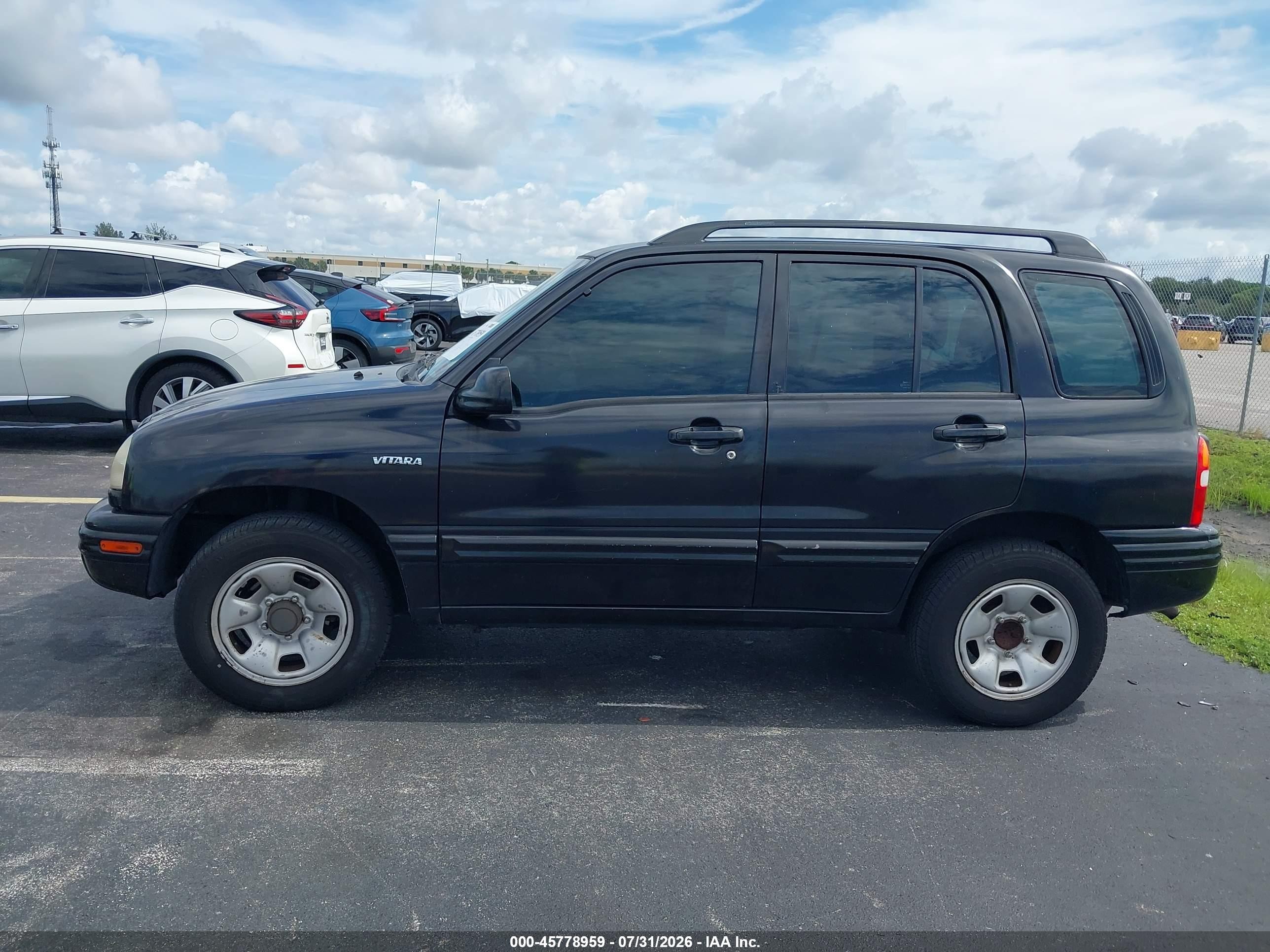 2002 Suzuki Vitara Jls Black vin: 2S3TE52VX26102597