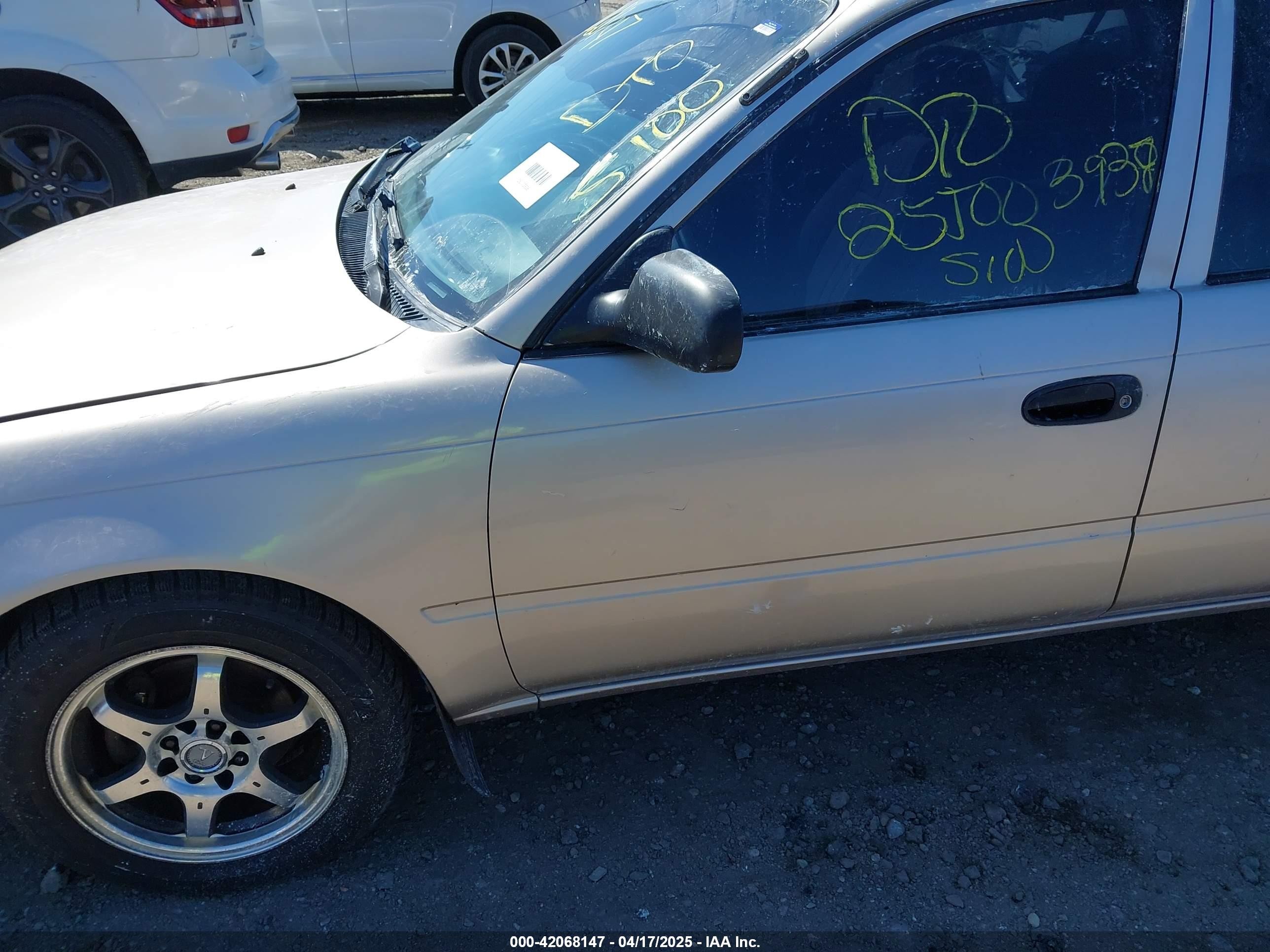 1995 Toyota Corolla   Tan vin: 2T1AE04B5SC086299