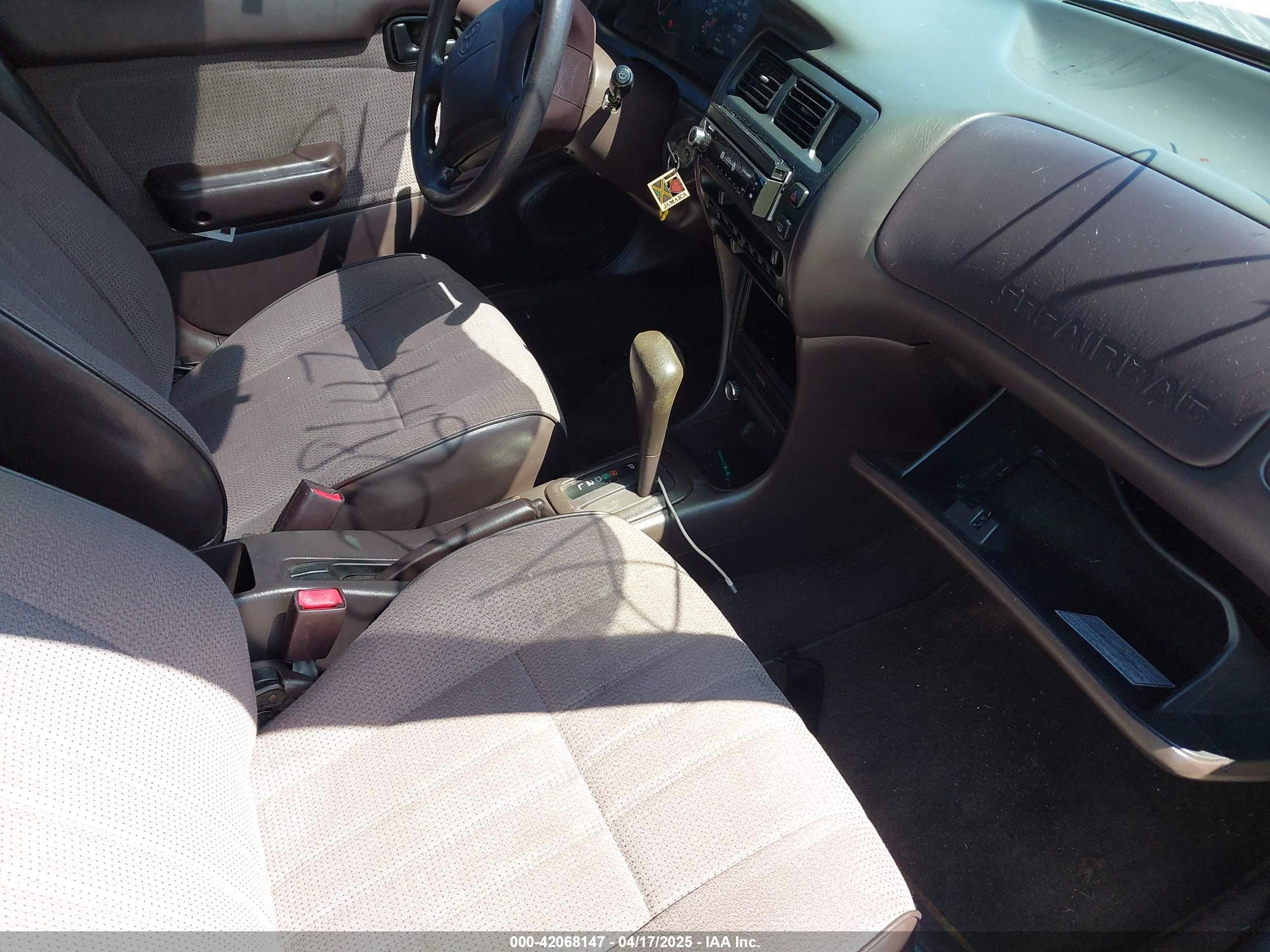 1995 Toyota Corolla   Tan vin: 2T1AE04B5SC086299