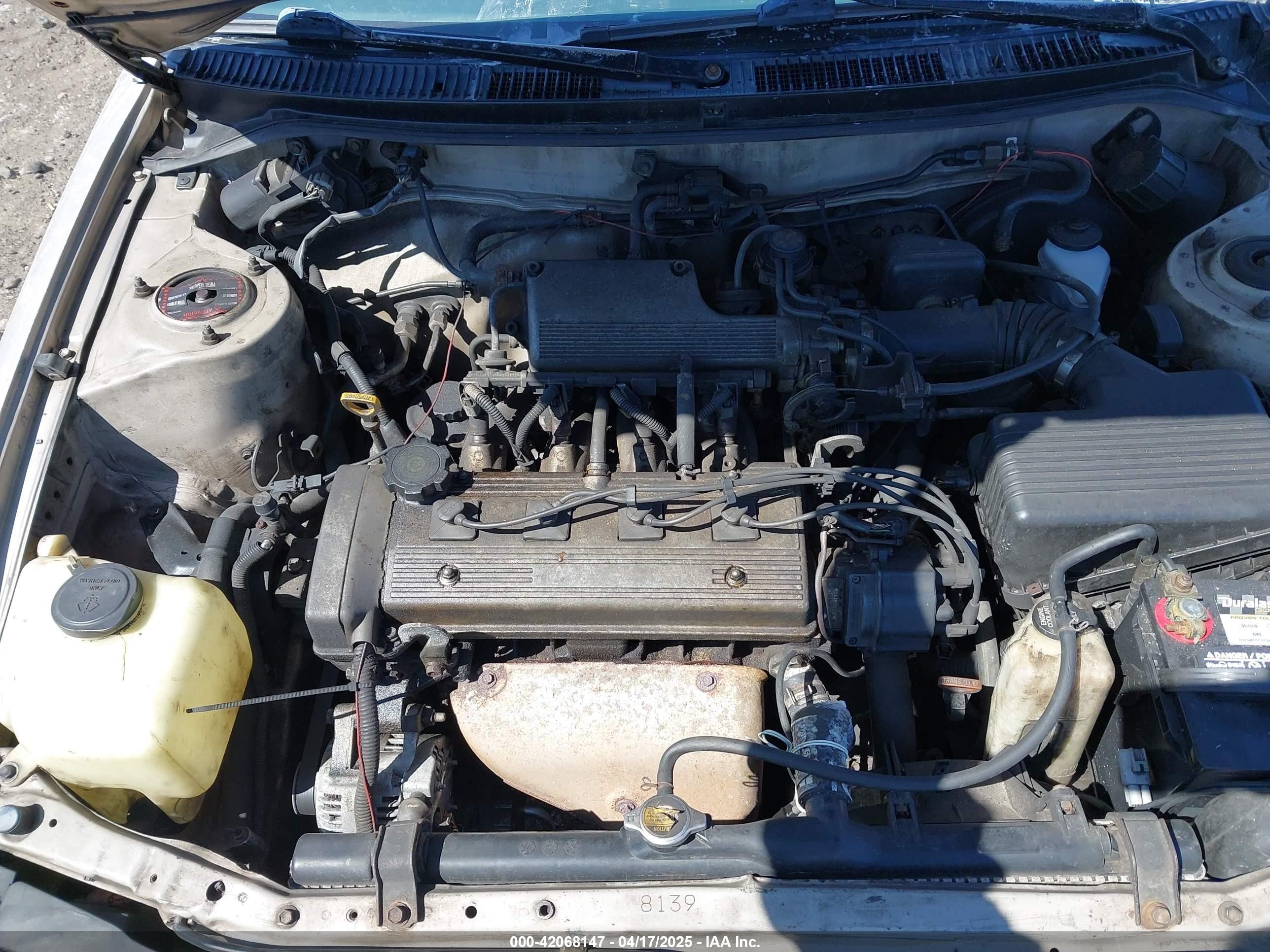 1995 Toyota Corolla   Tan vin: 2T1AE04B5SC086299