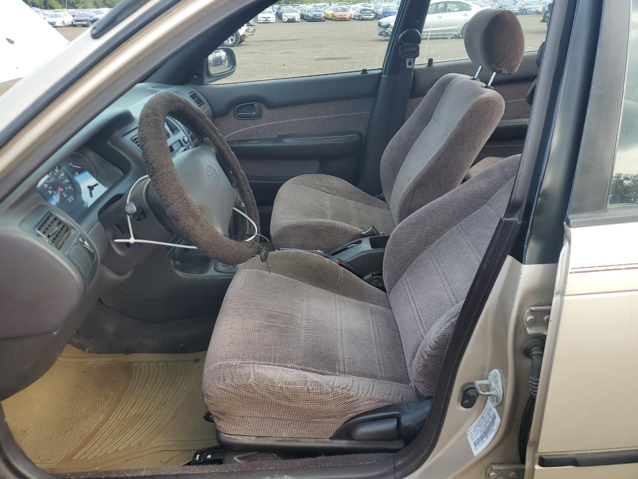 1995 Toyota Corolla Le Tan vin: 2T1AE09B8SC110720