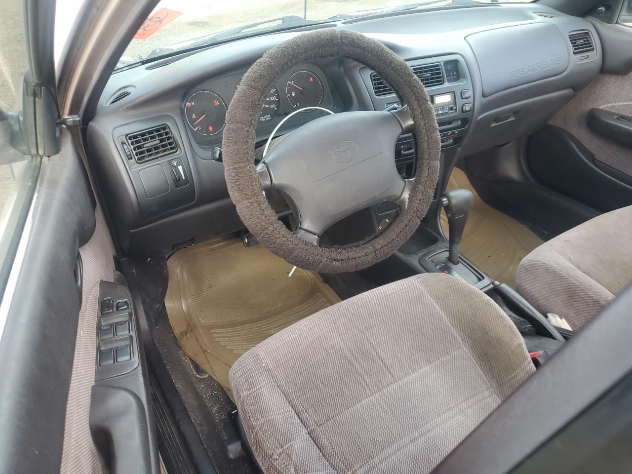 1995 Toyota Corolla Le Tan vin: 2T1AE09B8SC110720