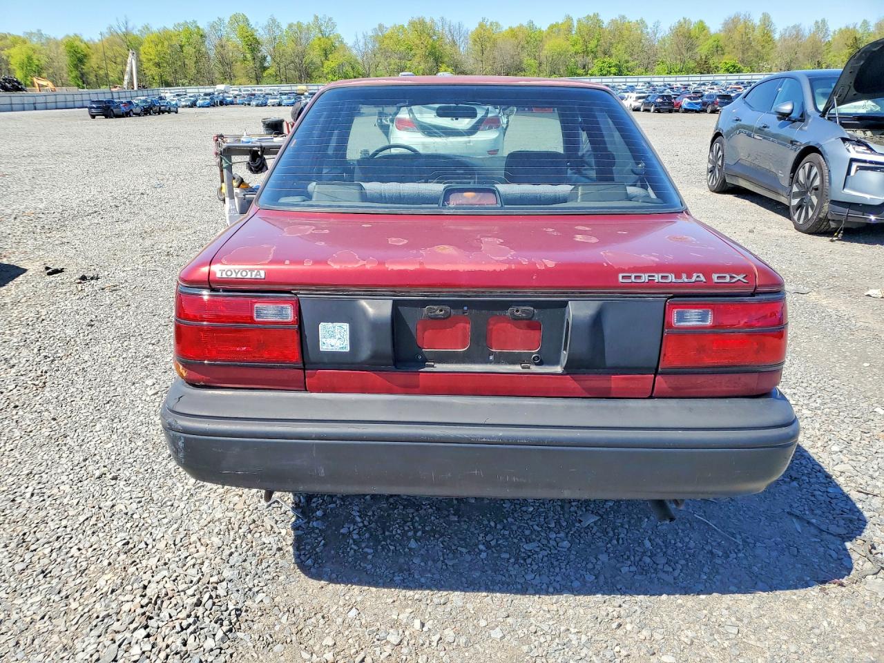 1990 Toyota Corolla Dlx Burgundy vin: 2T1AE94A8LC042326