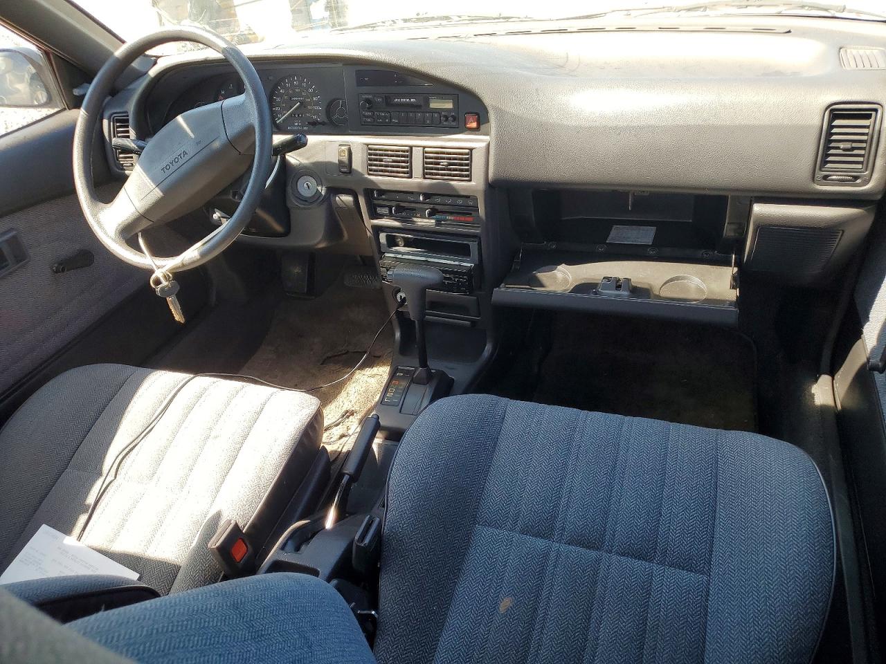 1990 Toyota Corolla Dlx Burgundy vin: 2T1AE94A8LC042326