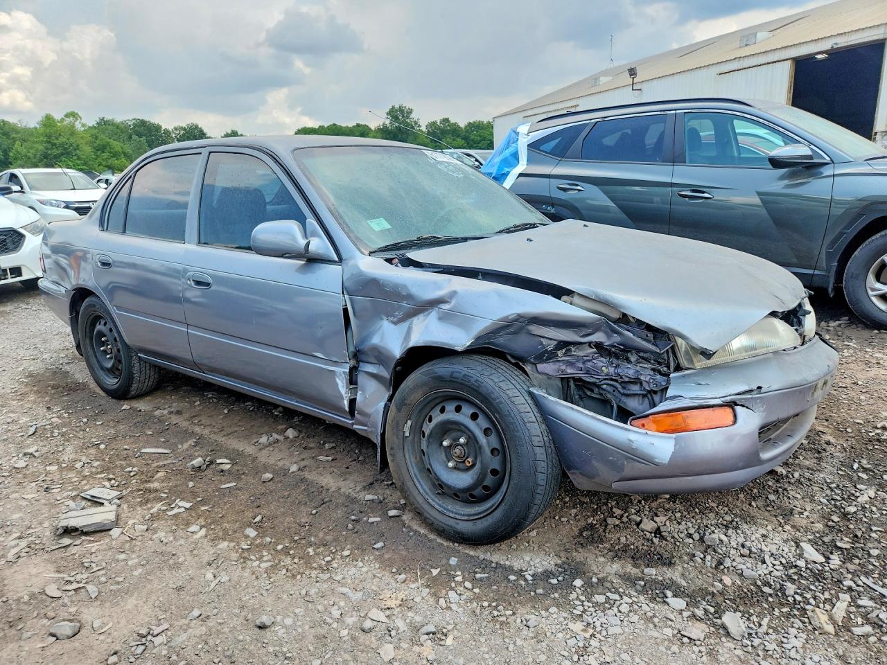 1997 Toyota Corolla Base Серый vin: 2T1BA02EXVC185072