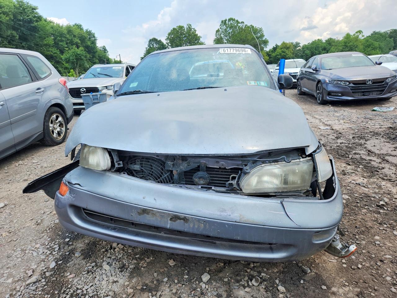 1997 Toyota Corolla Base Серый vin: 2T1BA02EXVC185072